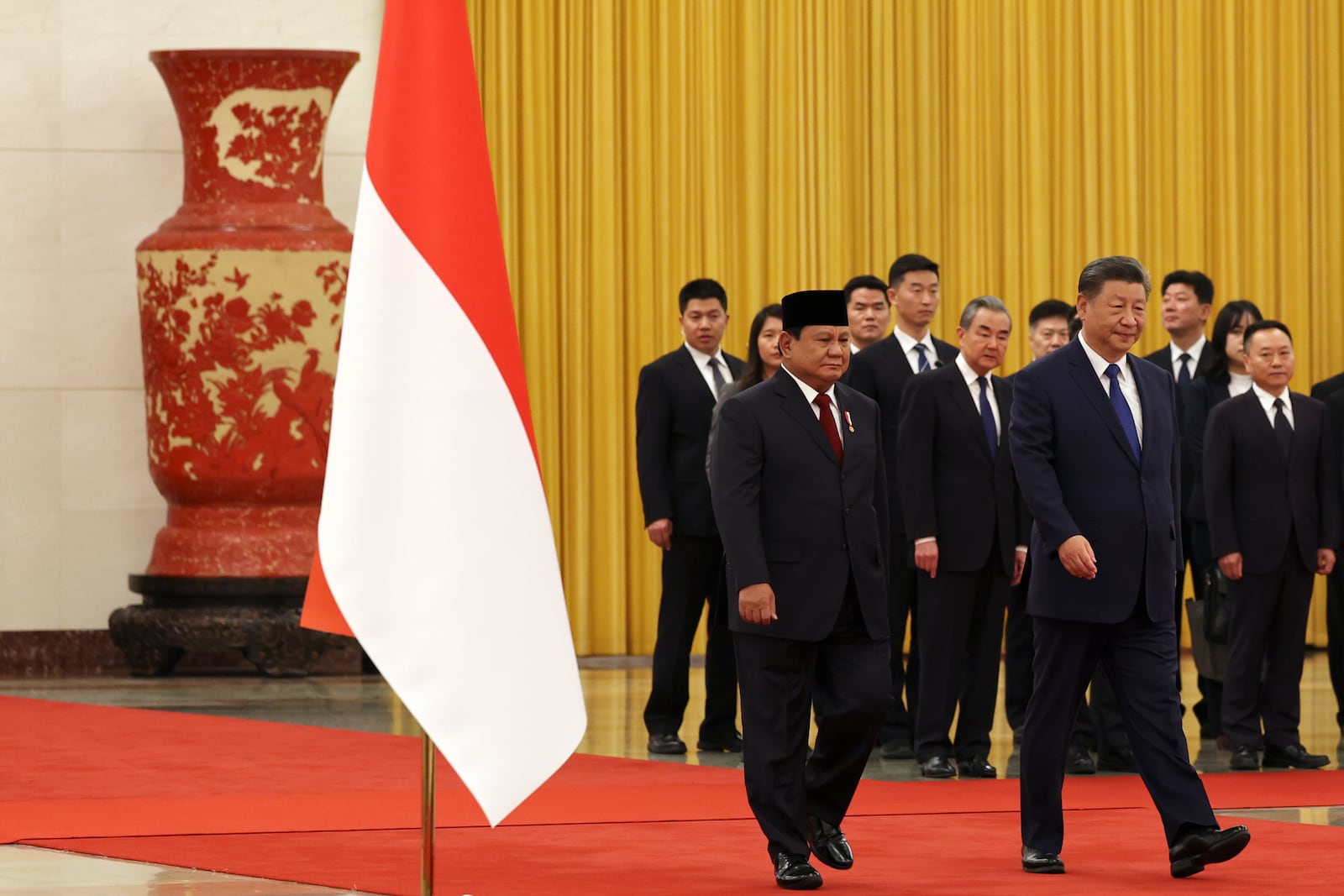 Chinese President Xi Jinping, right, and Indonesia's President Prabowo Subianto attend a welcome ceremony at the Great Hall of the People in Beijing, China, Nov. 9, 2024. (Florence Lo/Pool Photo via AP)