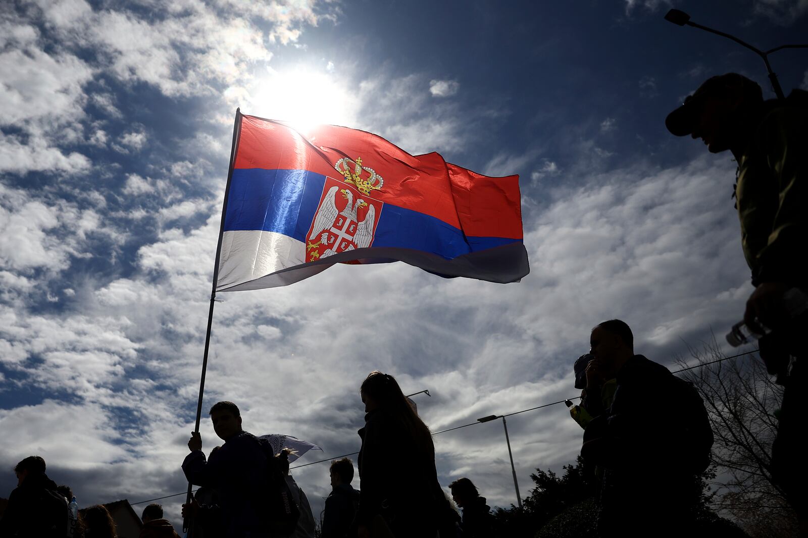 Students and anti-government protesters march to Belgrade for a joint protest after taking a break in Nova Pazova, Serbia, Friday, March 14, 2025. (AP Photo/Armin Durgut)