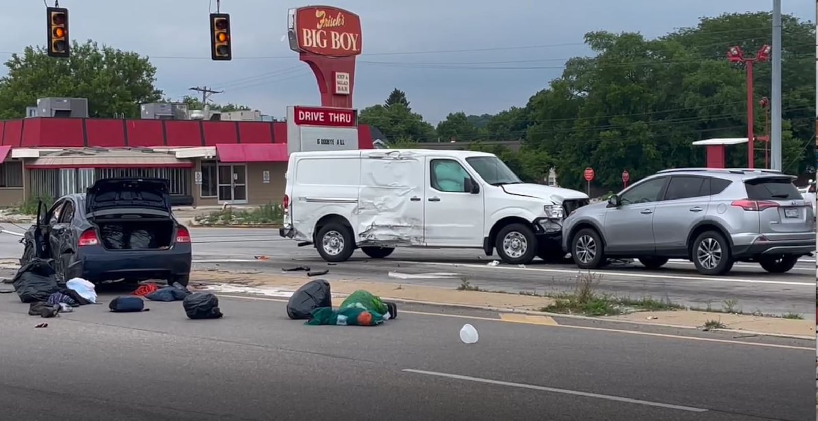 A police pursuit involving a stolen car that fled from police Friday afternoon, June 23, 2023, ended in a three-vehicle injury crash at North Springboro Pike and South Dixie Avenue in Moraine. JIM NOELKER/STAFF