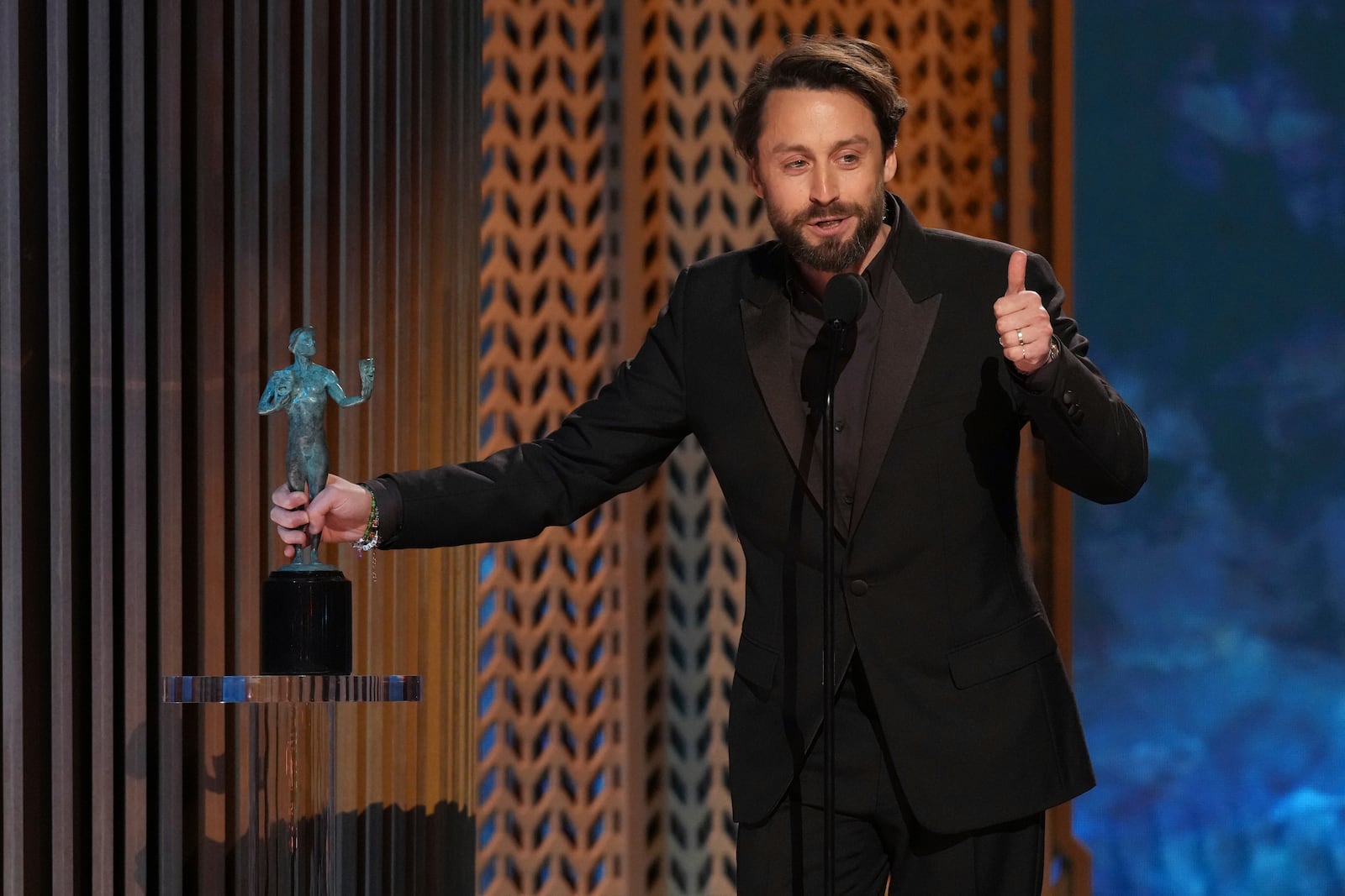 Kieran Culkin accepts the award for outstanding performance by a male actor in a supporting role for "A Real Pain" during the 31st annual Screen Actors Guild Awards on Sunday, Feb. 23, 2025, at the Shrine Auditorium in Los Angeles. (AP Photo/Chris Pizzello)