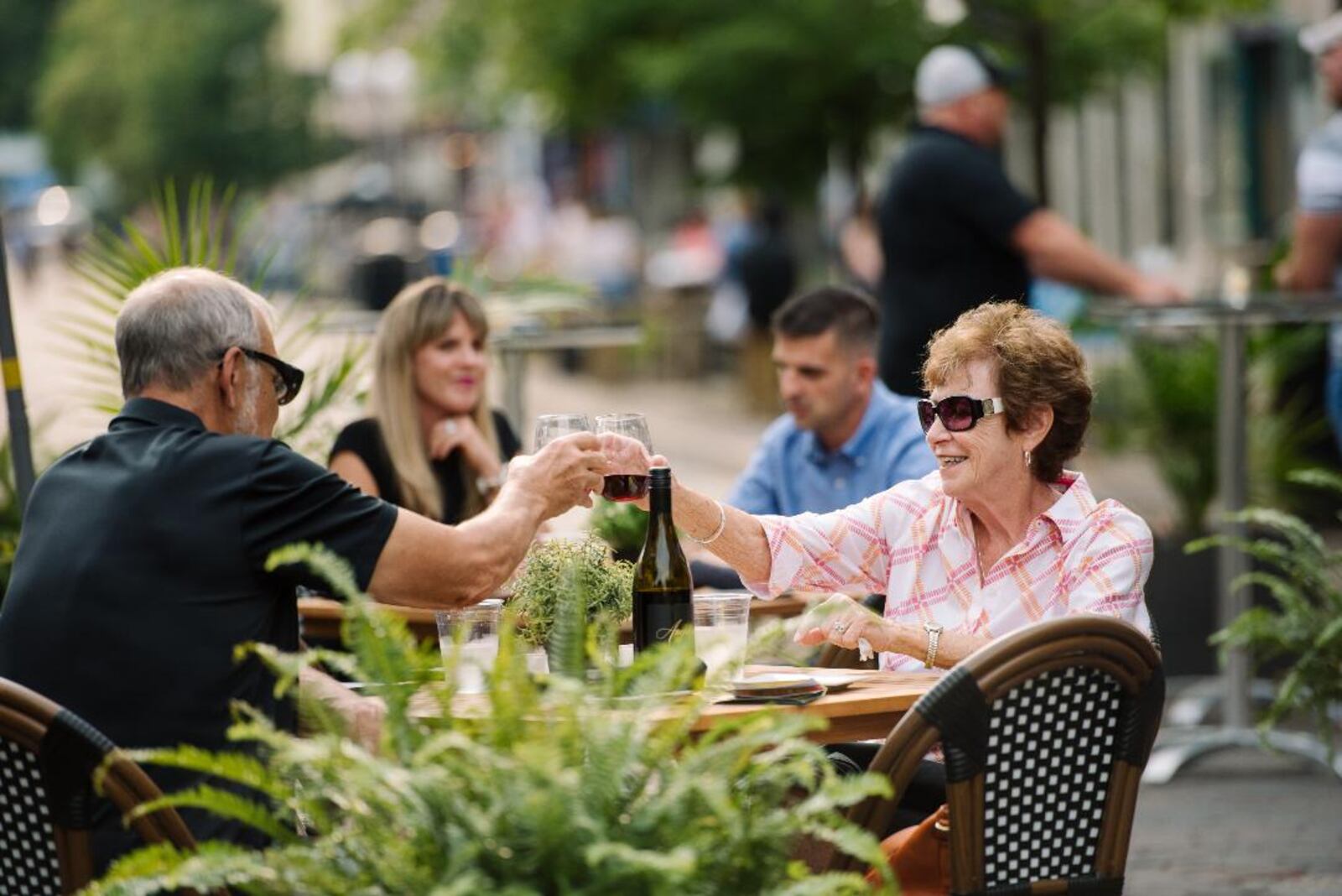 Couples enjoy outdoor dining during First Friday in downtown Dayton. CONTRIBUTED