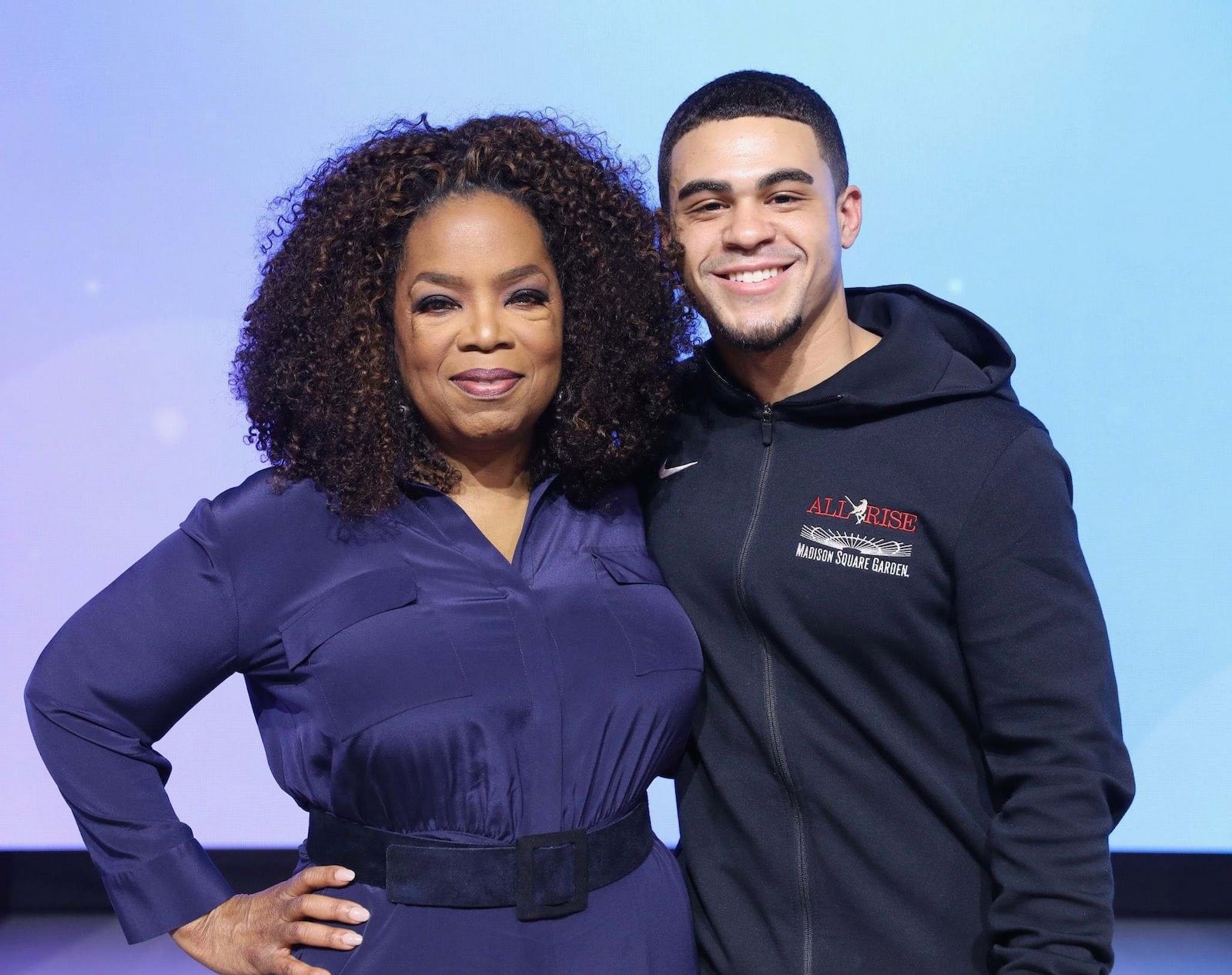 Darian Reynolds with Oprah on her tour. CONTRIBUTED