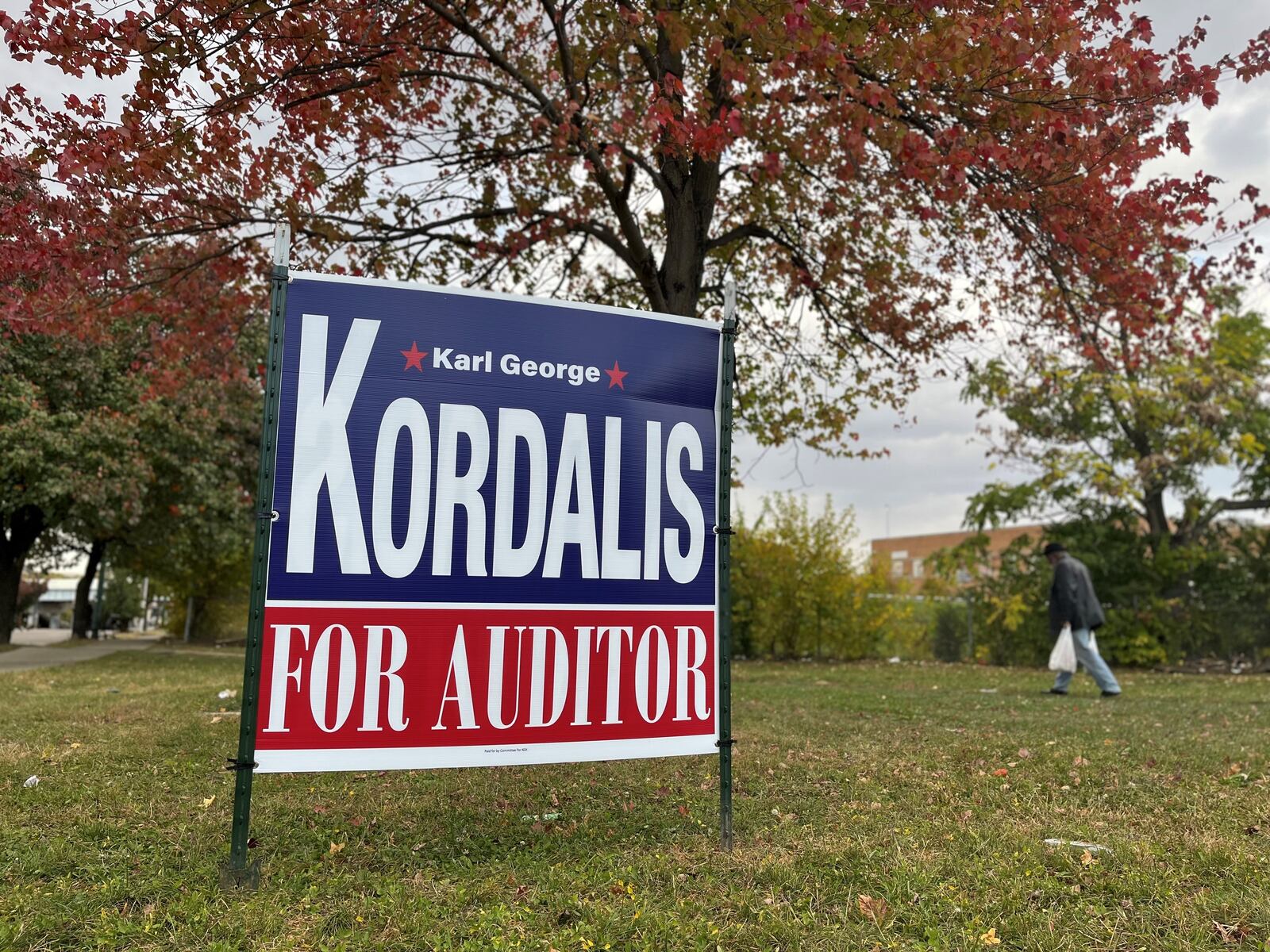 A sign for Karl George Kordalis along Wayne Avenue in Dayton. CORNELIUS FROLIK / STAFF