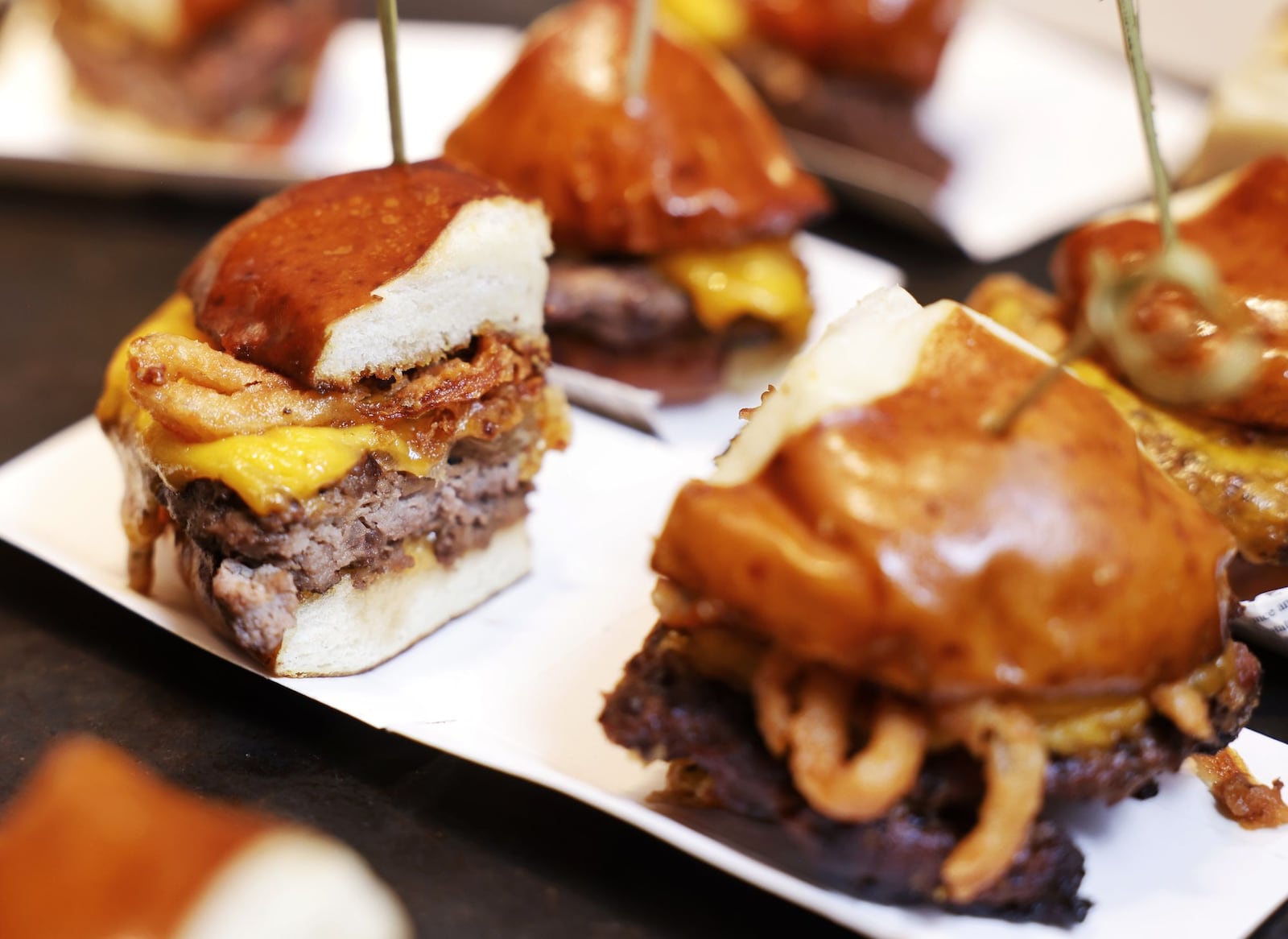 Miami Valley Gaming has opened two new restaurants inside their facility. Route 63 Comfort Classics and Lucia Italian are open with a variety of food items from sandwiches and salads to pizza and desserts and more. This is the beer cheese burger. NICK GRAHAM/STAFF