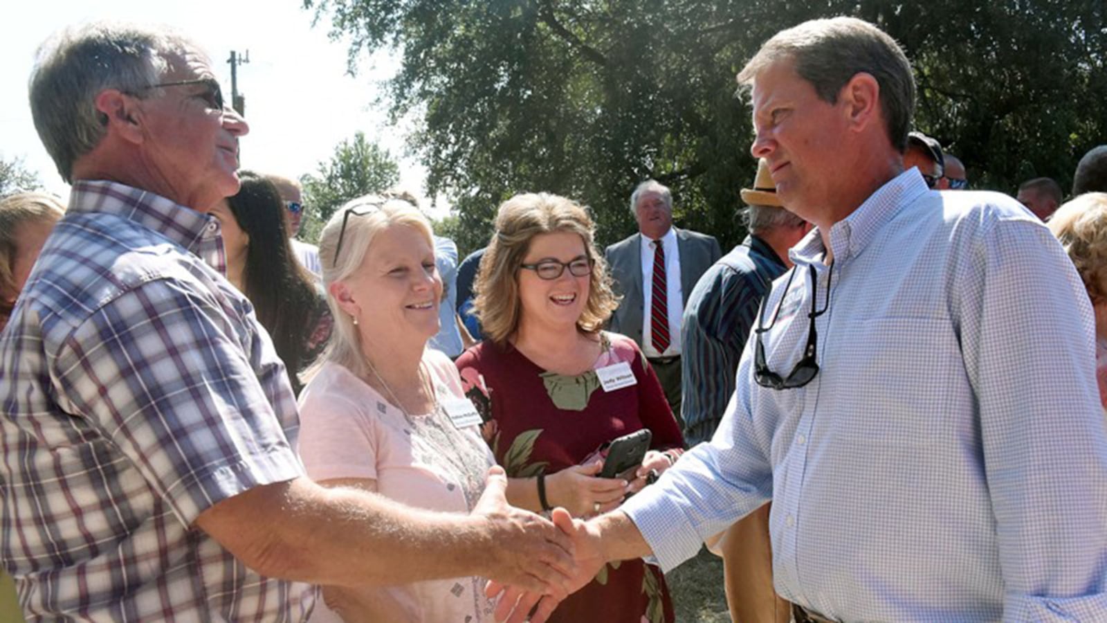 Republican candidate for governor Brian Kemp makes the rounds, greeting supporters, at a fish fry and rally at Griff Bowen’s Fish House in Rhine on Oct. 4. It was the third stop of the day on Kemp campaign trail, where hundreds of supporters gathered to hear the candidate speak.