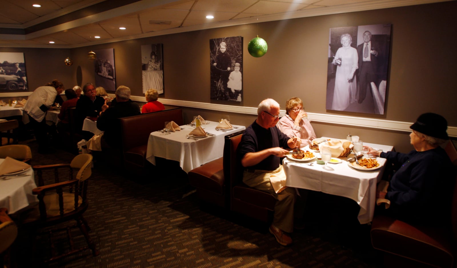 Diners enjoy their dinner in the newly renovated at Neil's Heritage House in Kettering. Dayton-area economic development and restaurant industry officials are hailing a 2011 surge of reborn restaurants across the Miami Valley as a strong sign of the regions economic recovery.