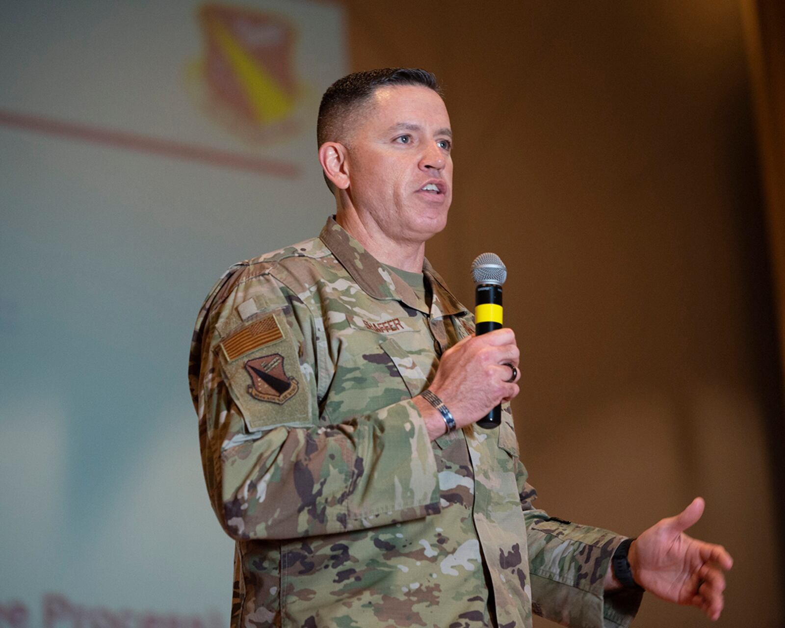 Chief Master Sgt. Jason Shaffer, 88th Air Base Wing command chief, speaks during a commander’s call on May 4 at Wright-Patterson Air Force Base. Shaffer spoke about maintaining both physical and mental readiness in the current political climate. U.S. AIR FORCE PHOTO/JAIMA FOGG