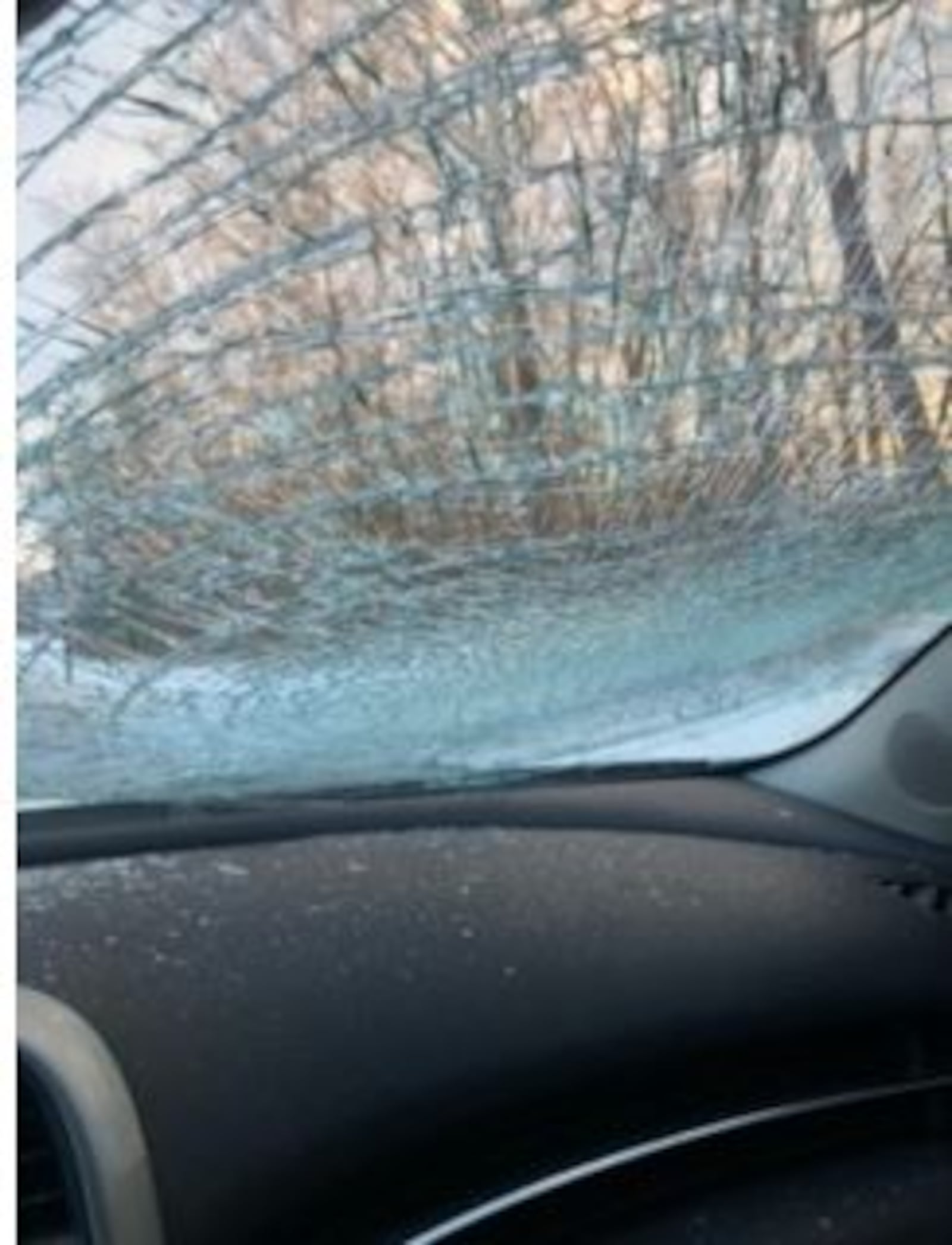 This vehicle was damaged Saturday on Interstate 71 south when a chunk of ice and snow flew off a vehicle and smashed the windshield of another car. The ice and snow chunk damaged the vehicle and sent glass shards flying on the passenger side of the vehicle. Other than some scratches, there were no injuries. CONTRIBUTED/JOEY KLEINOW