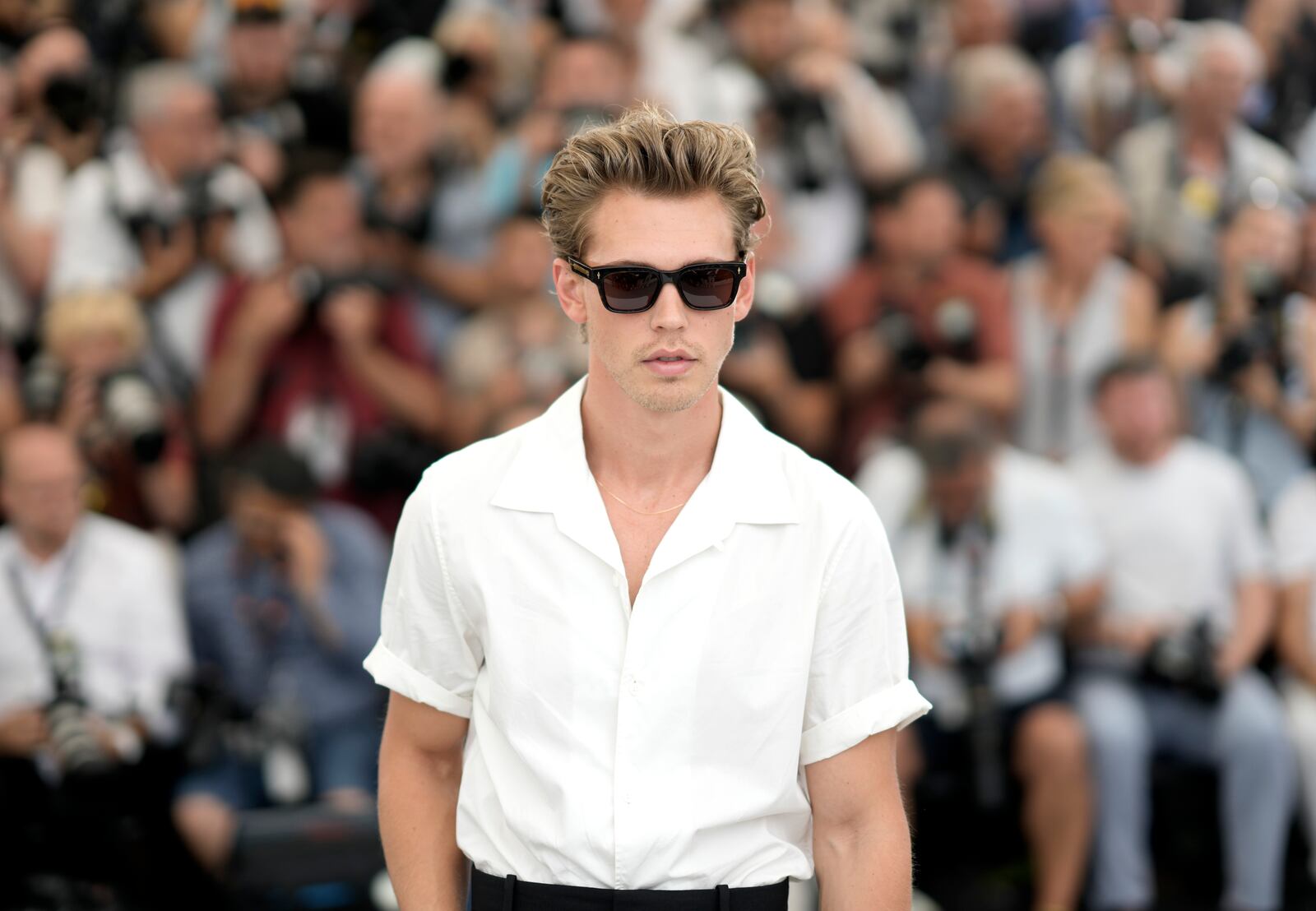 Austin Butler poses for photographers at the photo call for the film 'Elvis' at the 75th international film festival, Cannes, southern France, Thursday, May 26, 2022. (Photo by Joel C Ryan/Invision/AP)