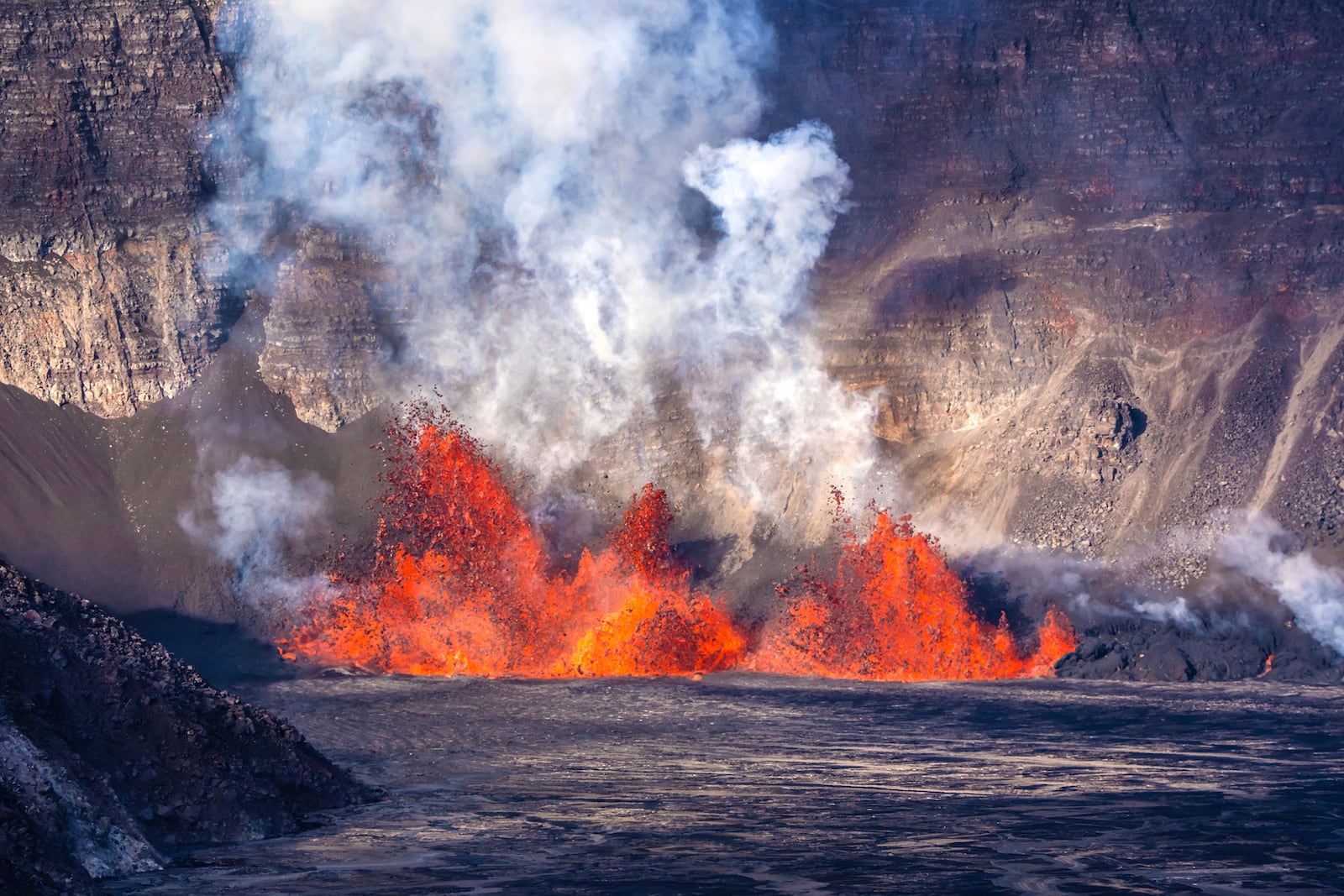 In this photo provided by the National Park Service, an eruption takes place on the summit of the Kilauea volcano in Hawaii, Monday, Dec. 23, 2024. (Janice Wei/NPS via AP)