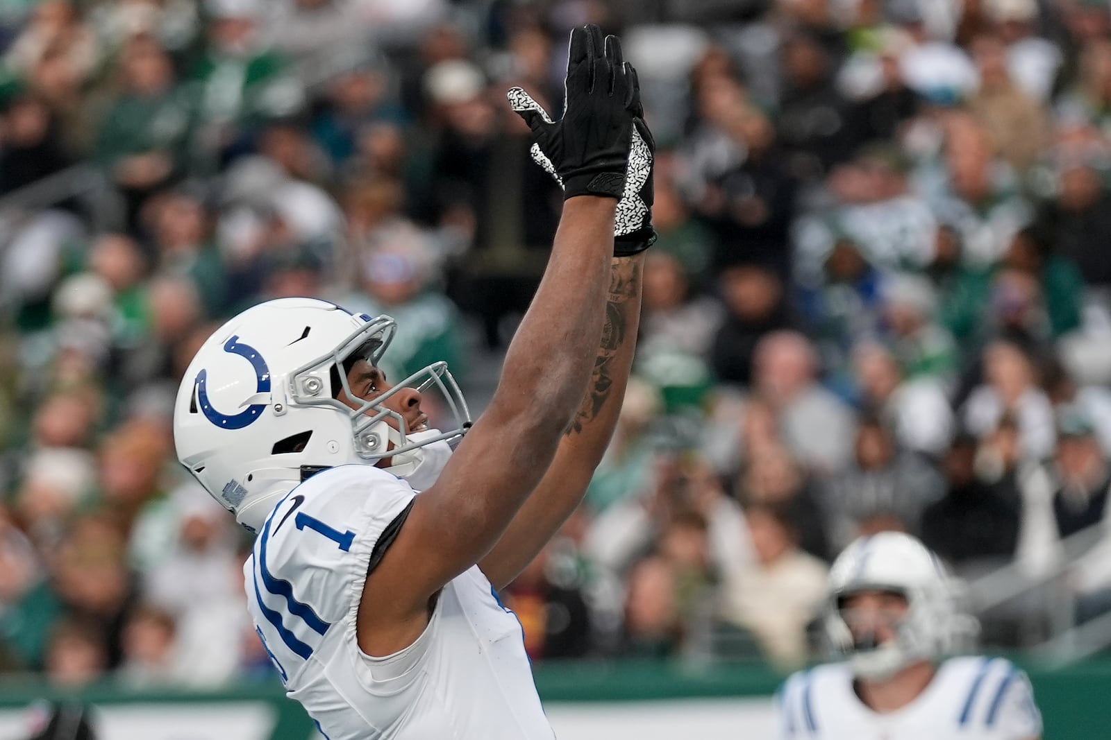 Indianapolis Colts wide receiver Josh Downs (1) reacts after scoring a touchdown against the New York Jets during the fourth quarter of an NFL football game, Sunday, Nov. 17, 2024, in East Rutherford, N.J. (AP Photo/Seth Wenig)