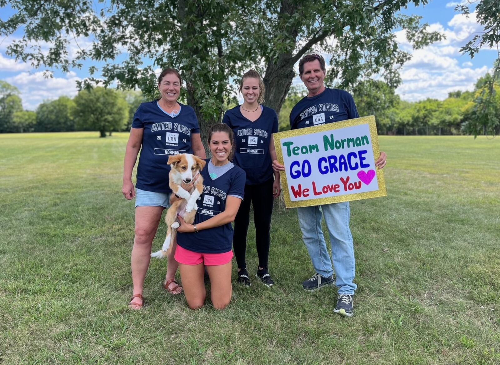 Grace Norman’s family sent their love from Ohio before heading to Paris. Kneeling with her dog is older sister Bethany. Standing (left to right) are her mom Robin, younger sister, Danielle, and dad, Tim. CONTRIBUTED