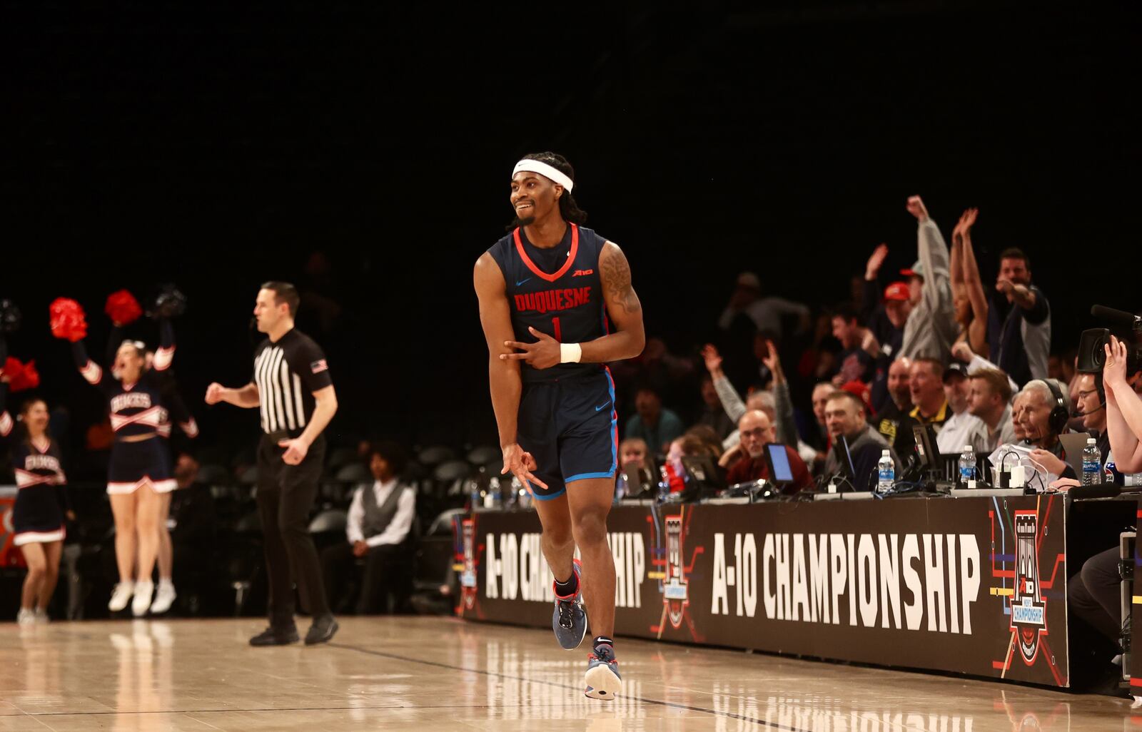 Duquesne's Jimmy Clark III celebrates after making a 3-pointer against Dayton in the final minutes in the Atlantic 10 Conference tournament quarterfinals on Thursday, March 14, 2024, at the Barclays Center in Brooklyn, N.Y. David Jablonski/Staff