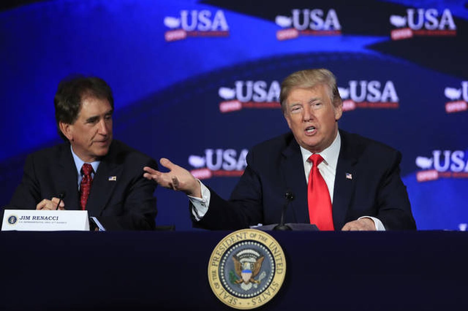 Rep. Jim Renacci, R-Wadsworth, shown here with President Donald Trump, has major policy differences with his opponent in the Senate race in Ohio, Sen. Sherrod Brown. Brown, seeking this third term, says the Trump tax cuts of last year are ballooning the deficit and benefitting mostly the rich. Renacci is a strong backer of the tax cuts - and Trump - and says Brown is mistaken about the tax cut benefits. GETTY PHOTO.