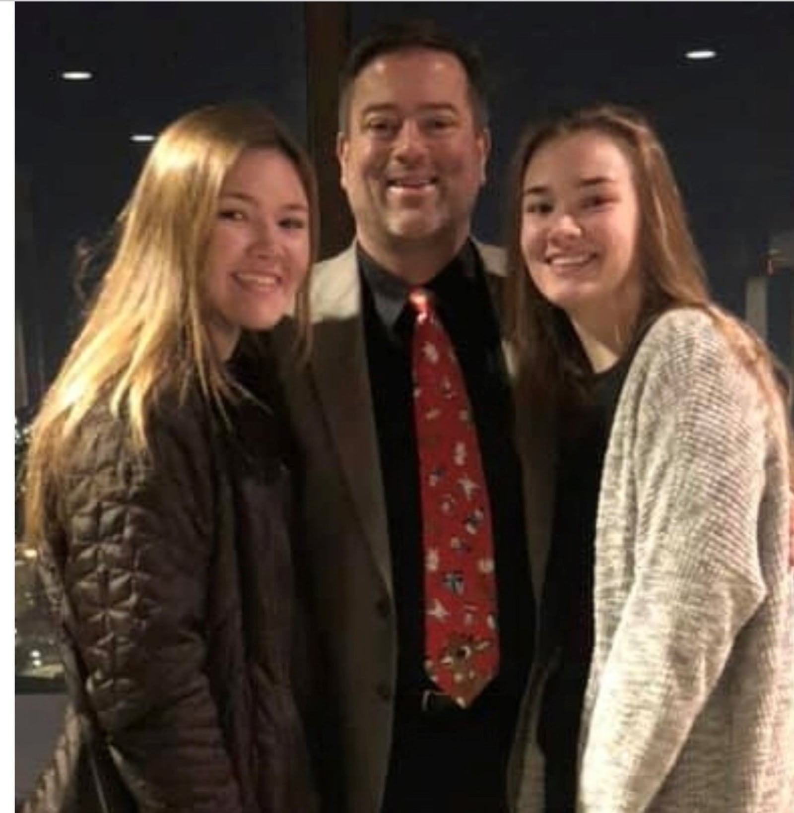 Jack Sperry flanked by two daughters, Emma Sperry (left), Jack Sperry, Alex Sperry (right). CONTRIBUTED