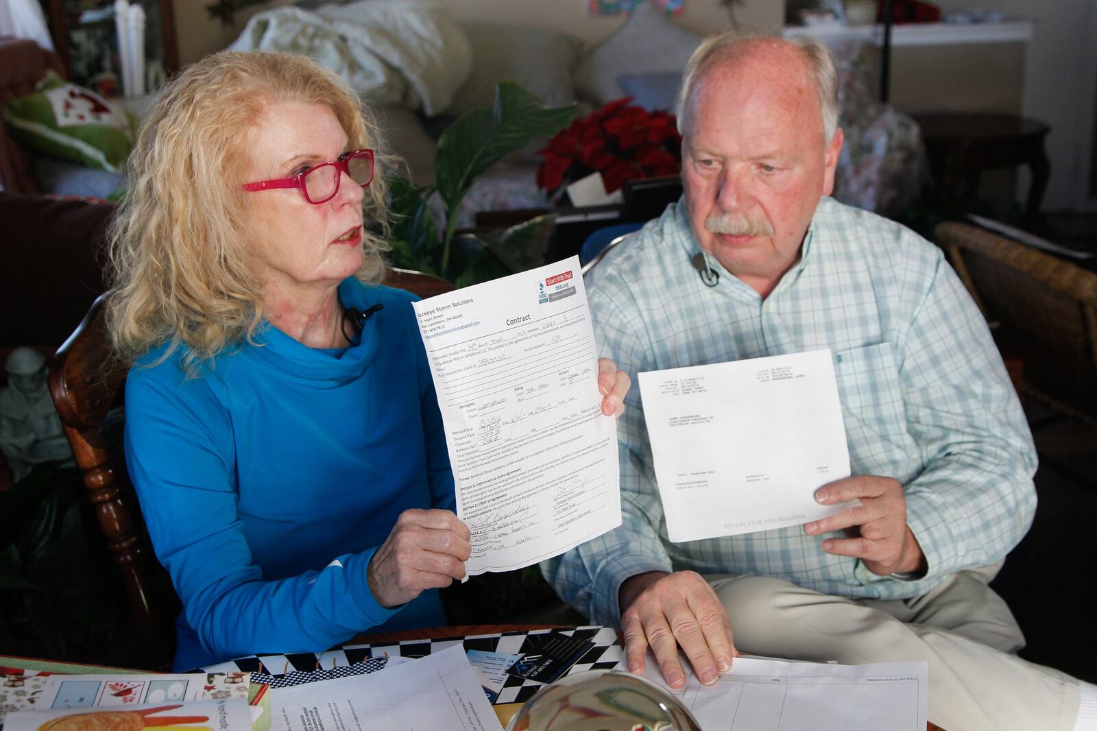 Kathy and Larry Borgerding of Dayton say they gave $7,700 to a contractor to begin repairs on their roof but never heard again from Brandon Valandingham, owner of Buckeye Storm Solutions. CHRIS STEWART / STAFF