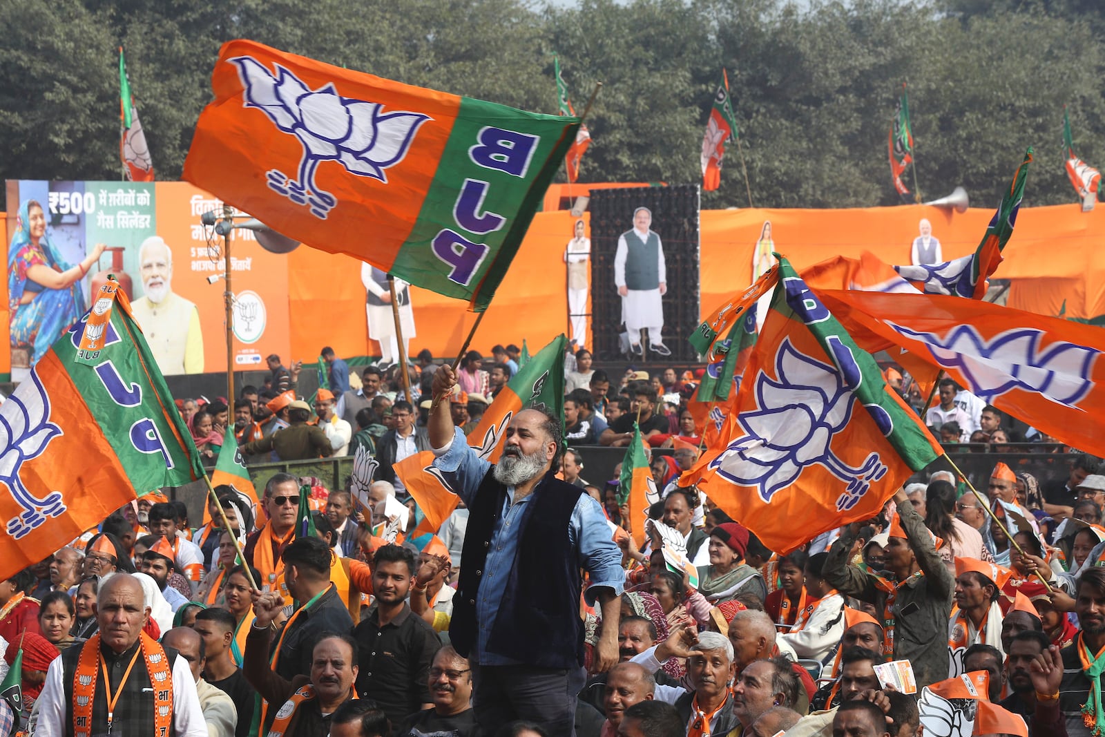 Supporters of Bharatiya Janata party shout slogans during Delhi state election campaign rally in New Delhi, India, Friday, Jan. 31, 2025. (AP Photo)