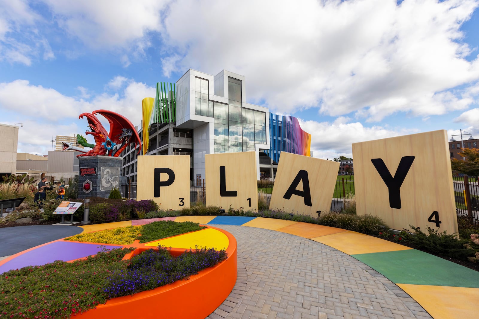 Large scrabble letters line the outdoor Hasbro Game Park at The Strong National Museum of Play, Tuesday, Oct. 15, 2024, in Rochester, N.Y. (AP Photo/Lauren Petracca)