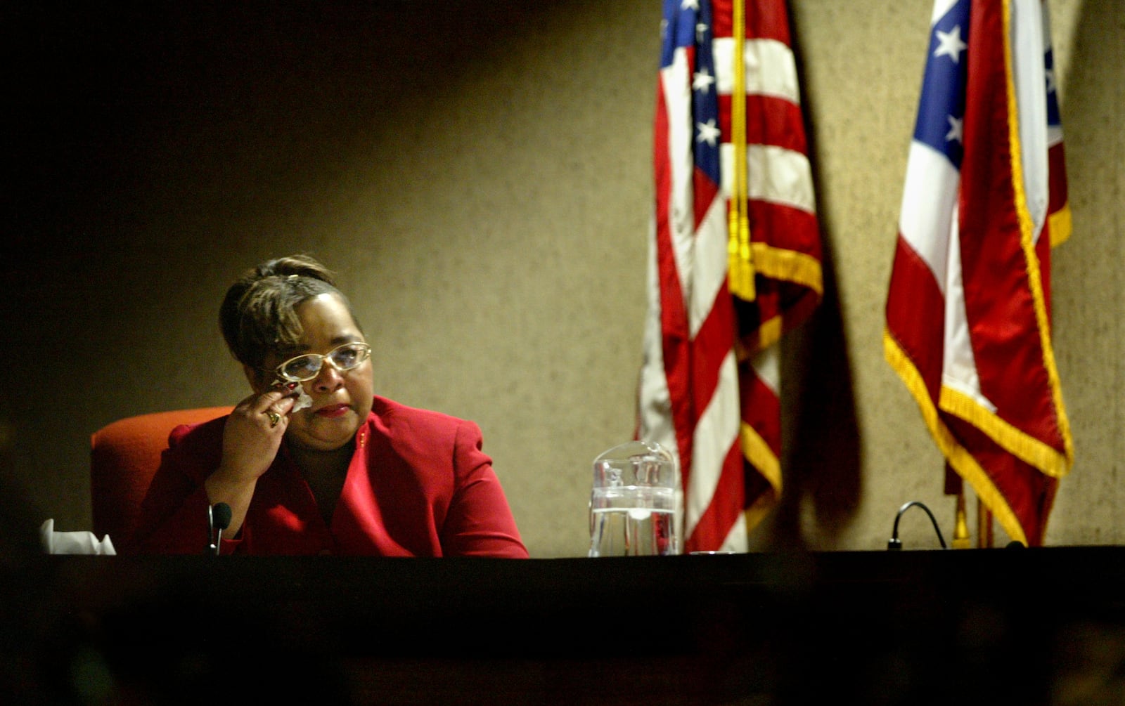 Idotha Bootsie Neal called her final Dayton city commission meeting Wednesday "emotional" and "bittersweet." Here she watches video highlights from her 12 years on the commission. Neal lost her seat in November to newcomer Matt Joseph.