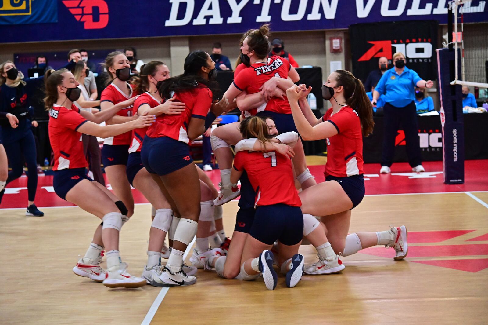 The Dayton Flyers celebrate after winning the Atlantic 10 Conference volleyball tournament championship on Saturday, April 3, 2021, at the Frericks Center. Photo by Erik Schelkun