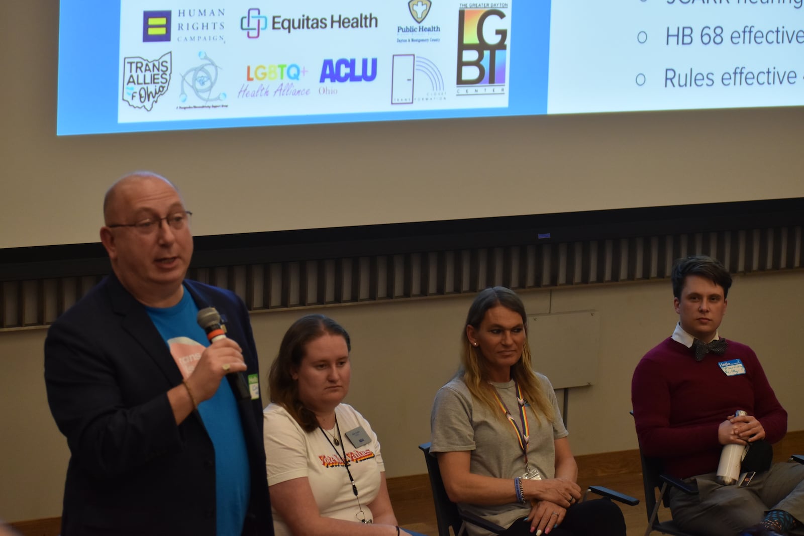 (Left to right) Colin Altman of the Human Rights Campaign (HRC) Cincinnati, Riley Taylor of ACLU Ohio, Bobbie Arnold of PFLAG Dayton, and Oliver Licking of Equitas Health during a recent PFLAG Dayton town hall event at the Dayton Metro Library. Altman and the panel answer questions and address the uncertainty ahead of the upcoming ban on gender-affirming medical care for minors. SAMANTHA WILDOW\STAFF