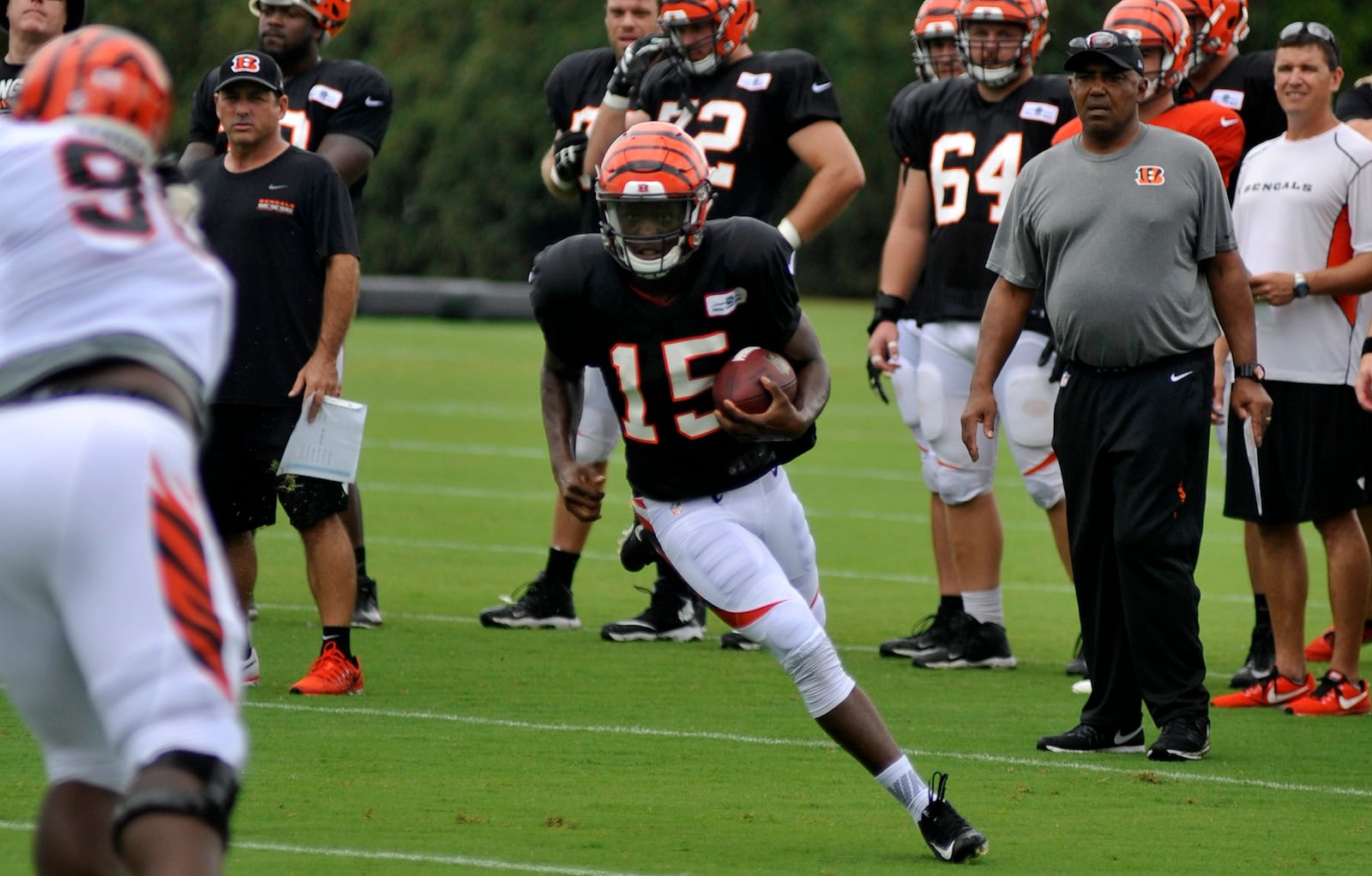 Cincinnati Bengals first-round pick John Ross runs with the ball during practice Monday at Paul Brown Stadium. JAY MORRISON/STAFF