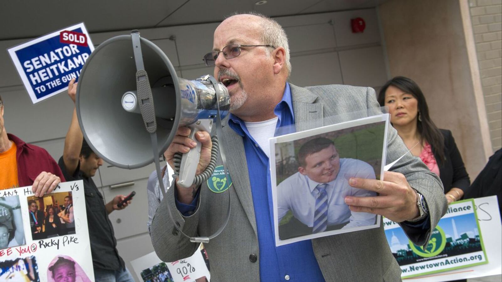 Tom Sullivan, father of Alex Sullivan, who was killed in the 2012 Aurora, Colo., movie theater massacre, speaks at a gun control rally April 2, 2014, in Washington, DC. Tom Sullivan, now a Colorado state representative, stood against the state's abolition of the death penalty, which Gov. Jared Polis signed into law Monday, March 23, 2020.