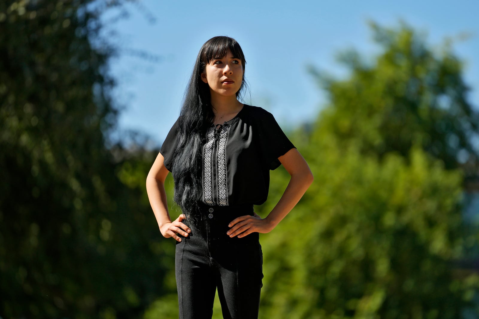 Jocelyn Ruiz, 26, pictured in Tempe, Ariz., Tuesday, Oct. 22, 2024, is a U.S. citizen who discovered a family secret that her mother could be deported at any time. (AP Photo/Matt York)