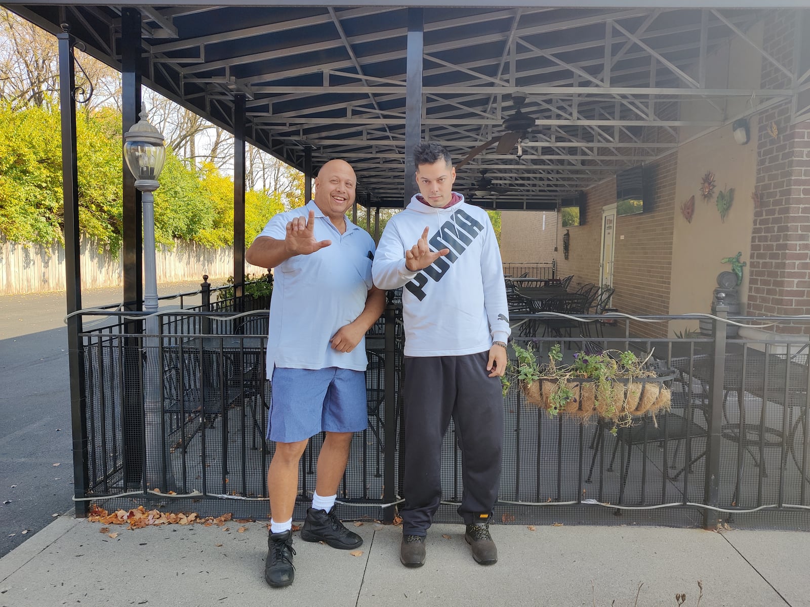 Kristian Lansangan (left) is the Pit Master of KingFu BBQ, while his son, Nathaniel Lansangan, is the Owner and Operations Sensei. CONTRIBUTED