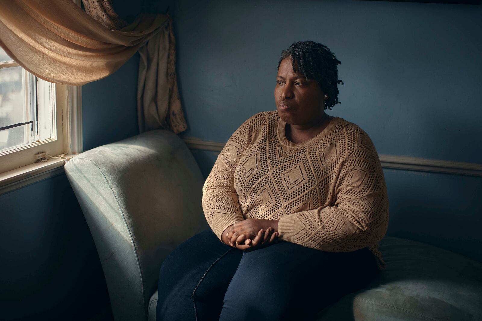 Widow Sharline Volcy poses for a portrait on Monday, Feb. 3, 2025, in Orange, N.J. (AP Photo/Andres Kudacki)