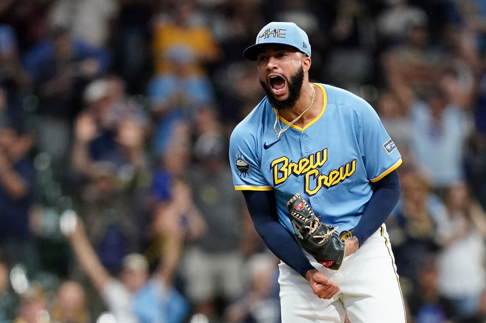 FILE - Milwaukee Brewers' Devin Williams reacts after recording a save during the ninth inning of a baseball game against the Arizona Diamondbacks, Sunday, Sept. 22, 2024, in Milwaukee. (AP Photo/Aaron Gash, File)