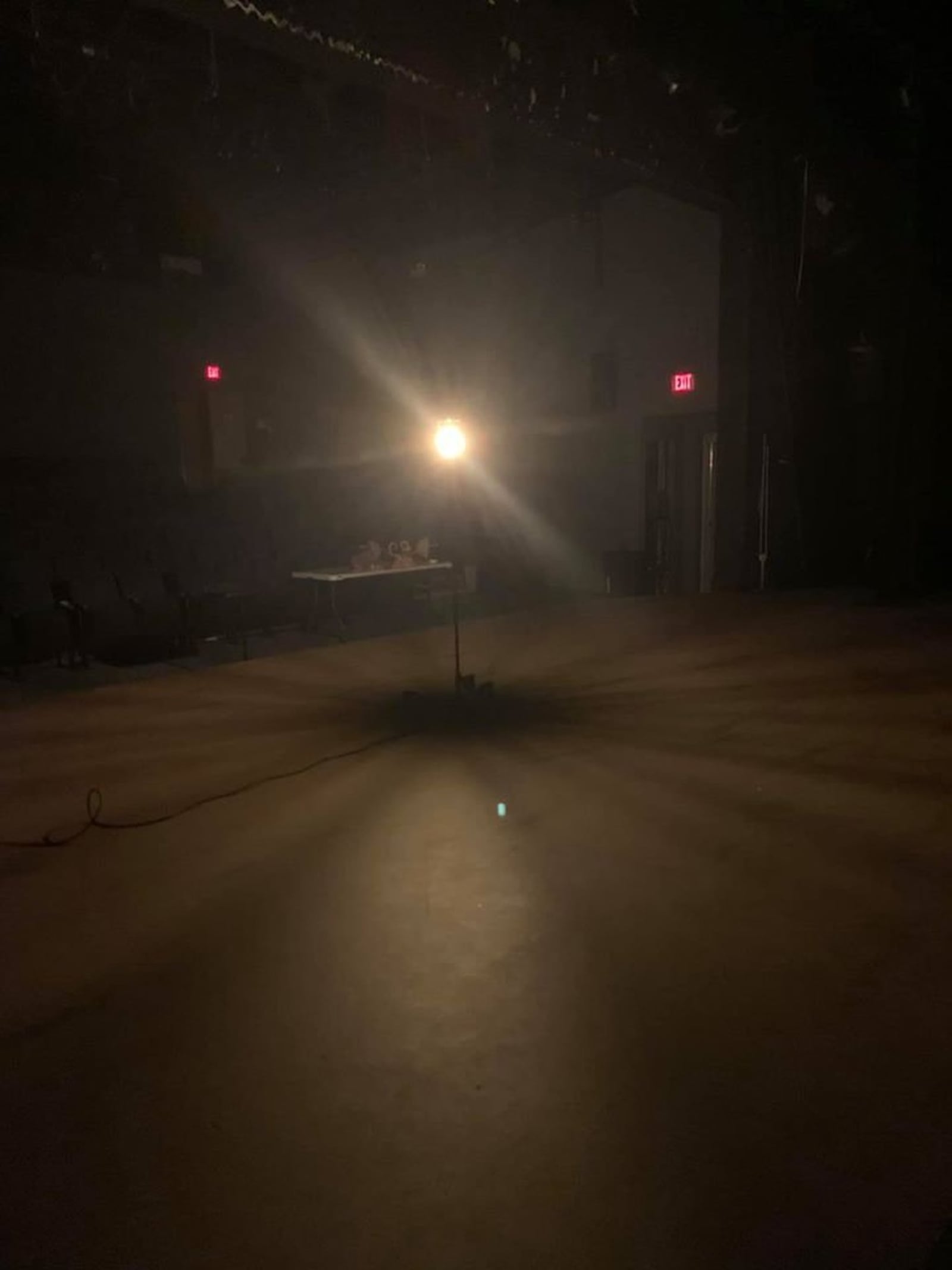 A theatrical ghost light illuminates the Dayton Playhouse stage. The Playhouse has canceled the remainder of its season due to the coronavirus outbreak. CONTRIBUTED/TINA MCPHEARSON