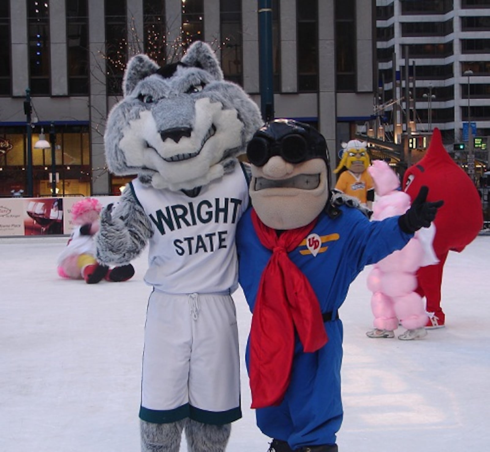 Sam Blaine â€” who portrays Rowdy Raider â€” and Emily Schenck â€” who portrays as Rudy Flyer â€” laced up to help kick off the Cincinnati Broomball Association on the ice-skating rink at Fountain Square in January 2009, one month before their engagement.