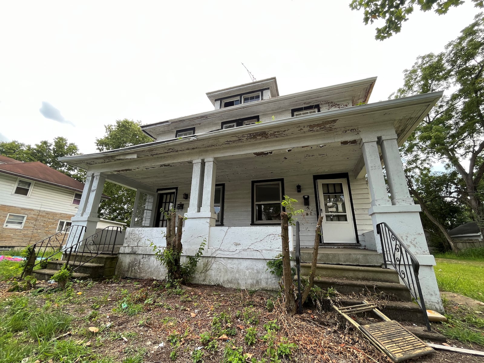 Dayton is preparing for its first round of demolition using federal COVID relief funds, and this duplex on the 300 block of Kenwood Avenue in the Five Oaks neighborhood is going to come down. Five blighted properties on the street will be torn down, including four on the 300 block. CORNELIUS FROLIK / STAFF