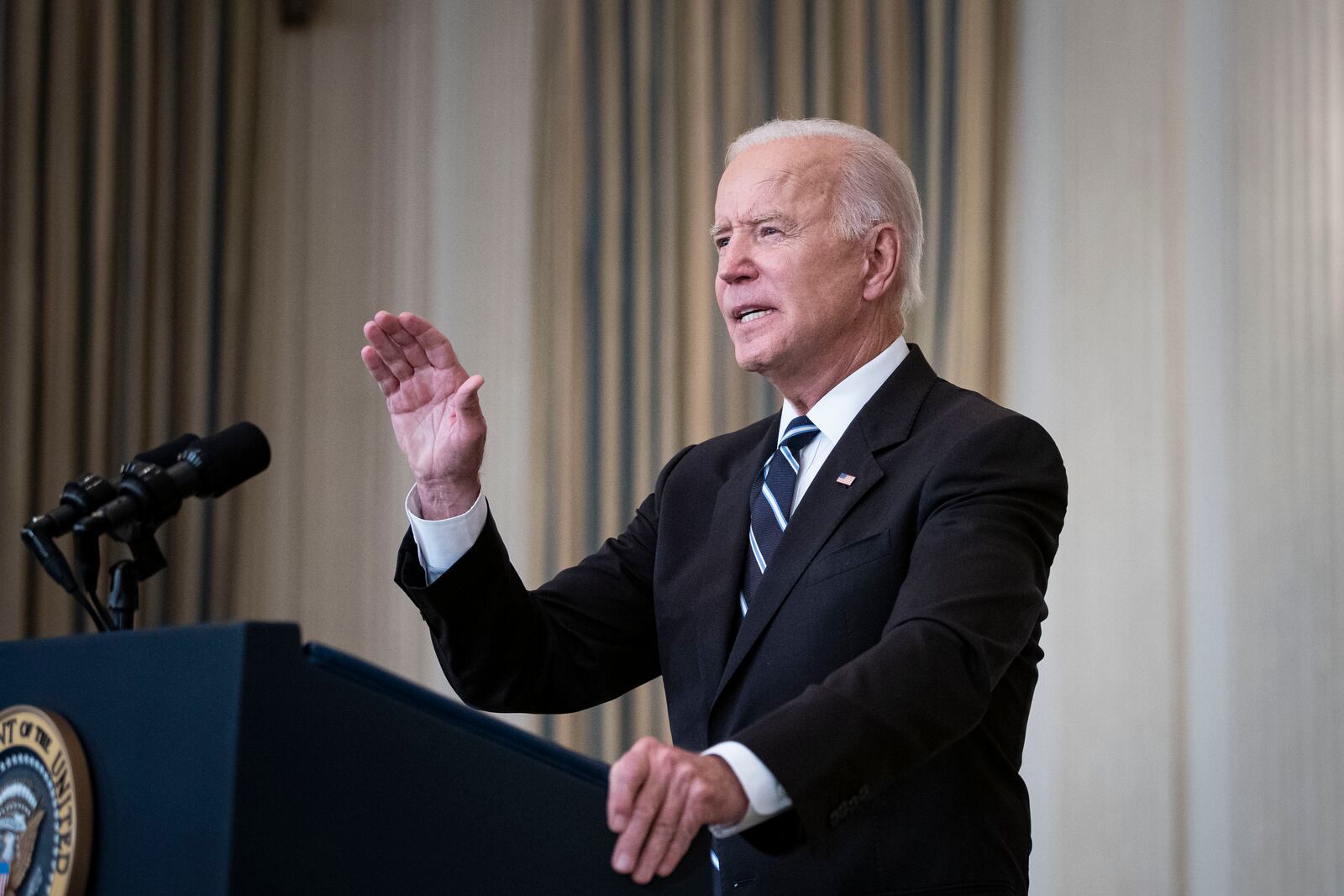 President Joe Biden delivers remarks on the Delta variant and Covid-19 vaccinations from the State Dining Room of the White House in Washington, Sept. 9, 2021.  Biden said the Department of Labor is drafting a rule mandating that all businesses with 100 or more workers require their employees to either get vaccinated against the coronavirus or face mandatory weekly testing. (Al Drago/The New York Times)