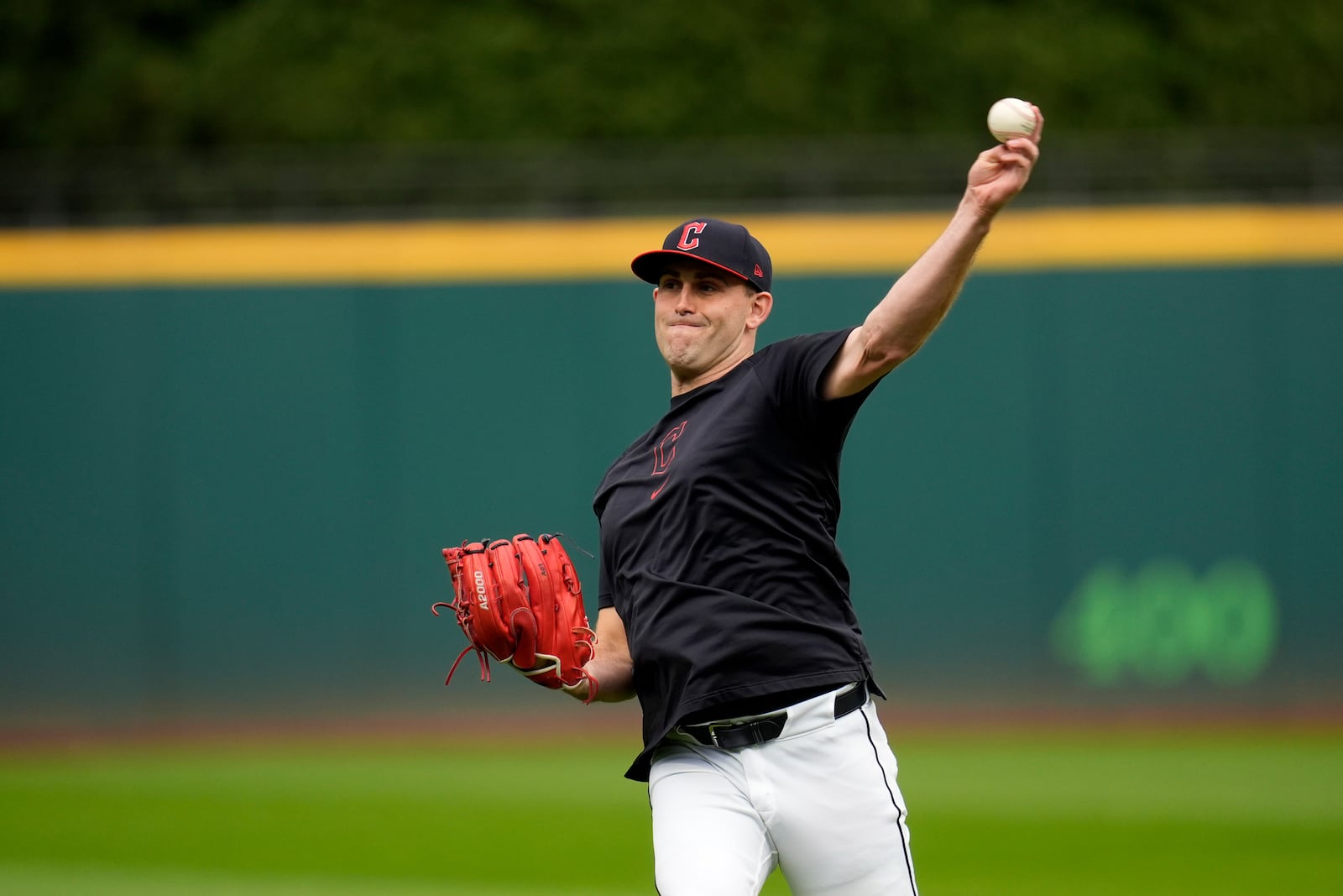 Cleveland Guardians' Matthew Boyd throws during a workout Wednesday, Oct. 16, 2024, in Cleveland, ahead of Game 3 of the baseball AL Championship Series. (AP Photo/Sue Ogrocki)