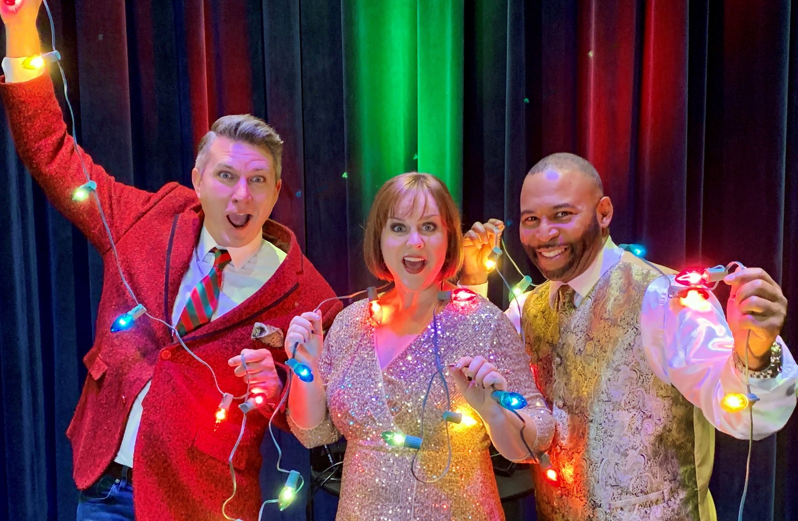 left to right: Philip Drennen, Gina Handy and Deron Bell of "Season's Greetings," performing 