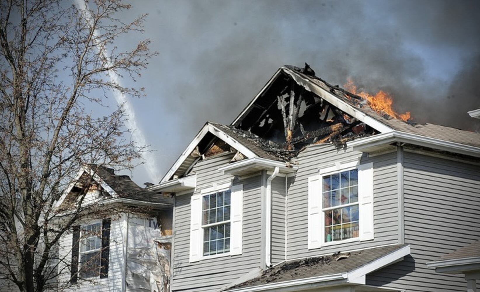 Dayton Fire department battles 2 house fires on Trieschman  Ave.