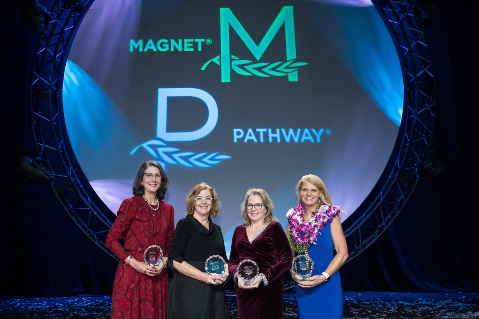 (From L to R): Empirical Outcomes winner Ellen Harvey of Carilion Roanoke Memorial Hospital in Roanoke, Va.; Transformational Leadership winner Tracy Morrison of Miami Valley Hospital in Dayton, Ohio; Structural Empowerment winner Denise Abdoo of Children’s Hospital of Colorado Child Protection Team in Aurora, Col.; and Exemplary Professional Practice winner Jennifer Moran of The Queens Medical Center in Honolulu, Hawaii. Photo courtesy Premier Health.