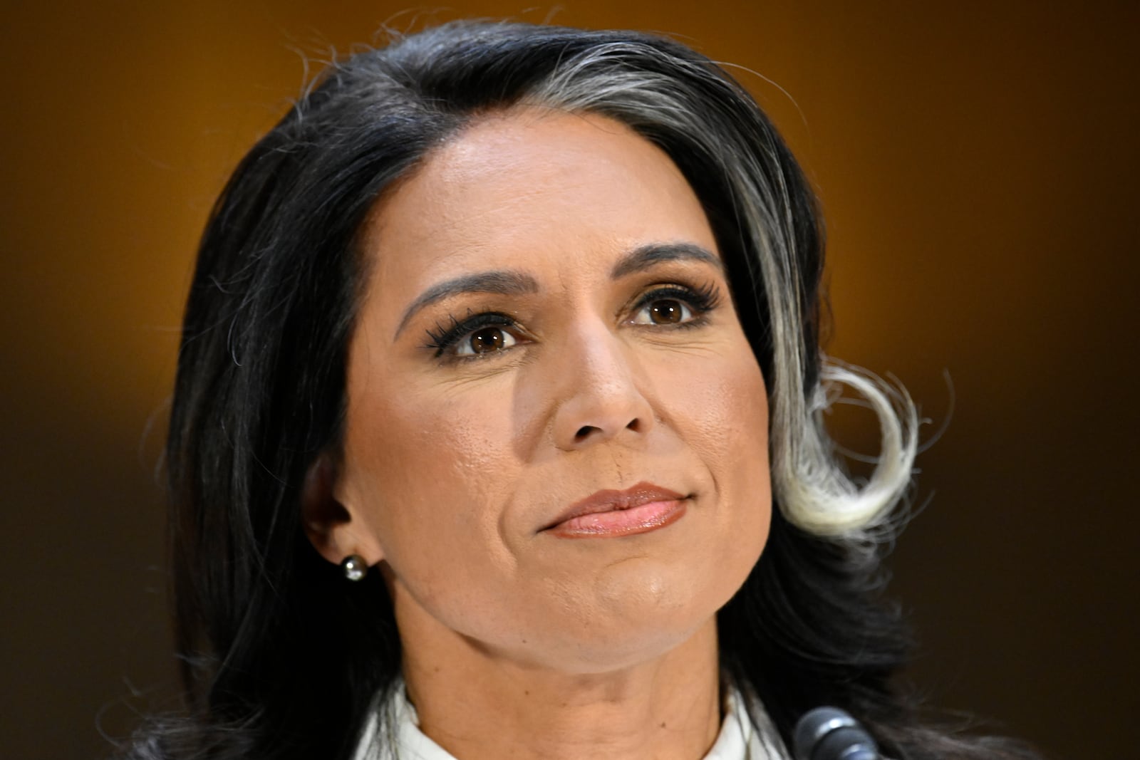 ulsi Gabbard, President Donald Trump's choice to be the Director of National Intelligence, appears before the Senate Intelligence Committee for her confirmation hearing on Capitol Hill Thursday, Jan. 30, 2025, in Washington. (AP Photo/John McDonnell)