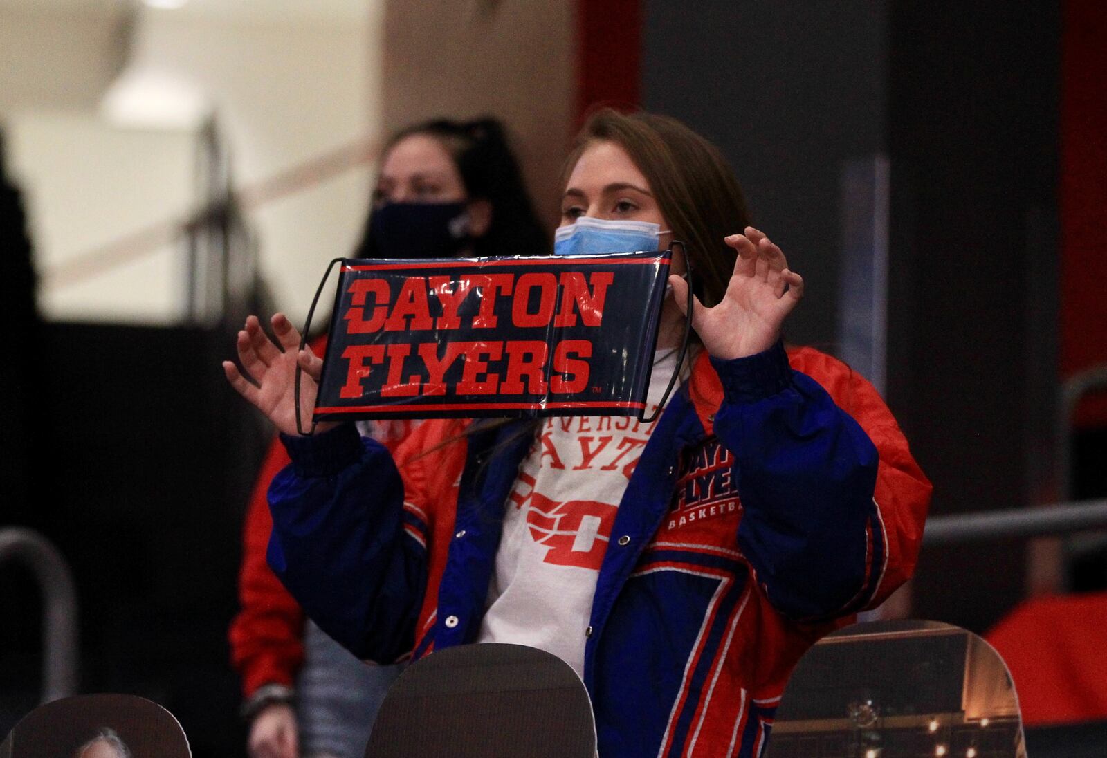 A UD student cheers during a game against Southern Methodist on Saturday, Dec. 5, 2020, at UD Arena. David Jablonski/Staff