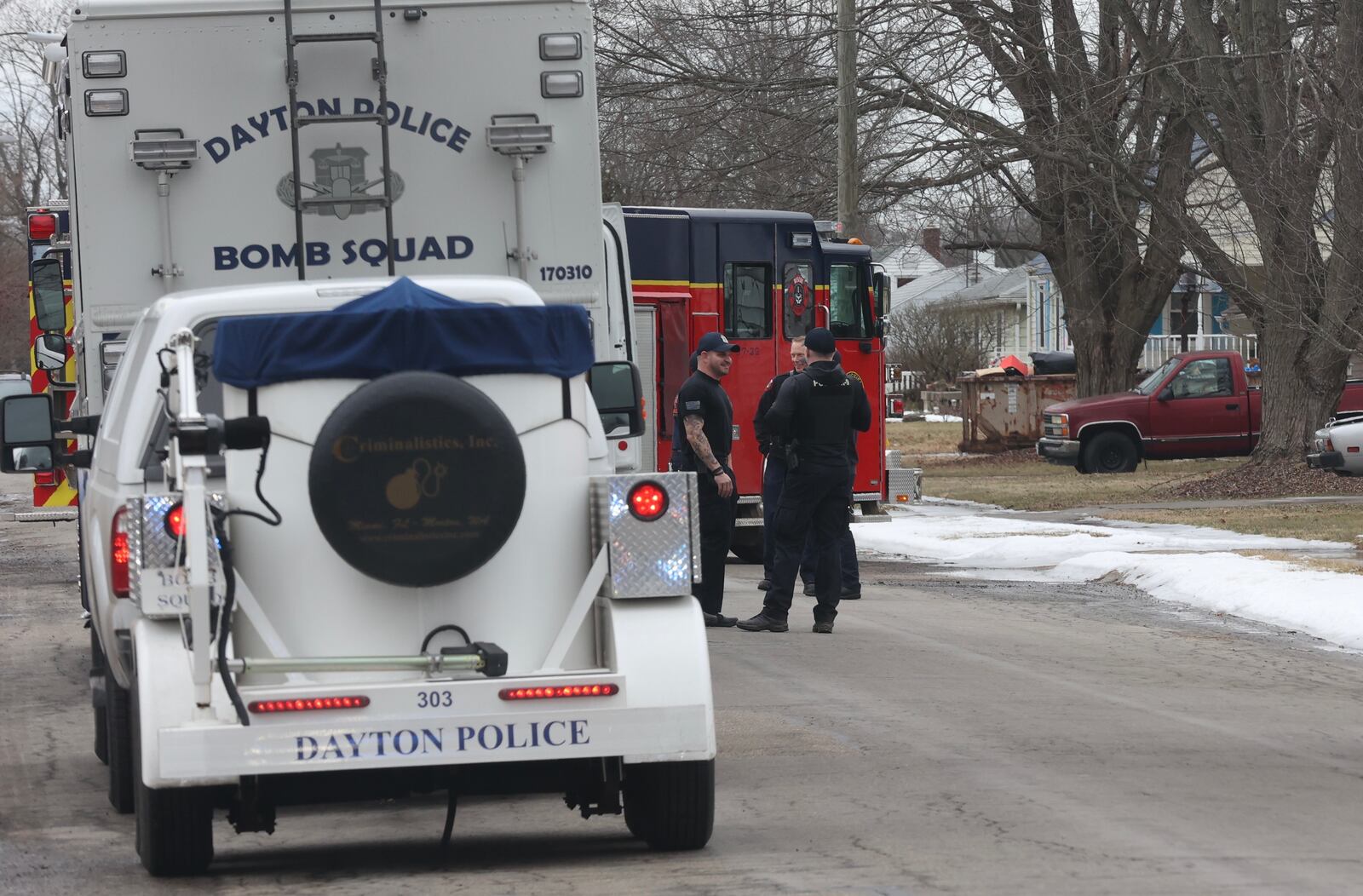 Springfield police and fire blocked off Victory Drive after people cleaning out a house found suspected dynamite. The Dayton Bomb Squad determined the 14 sticks were old road flares. BILL LACKEY/STAFF