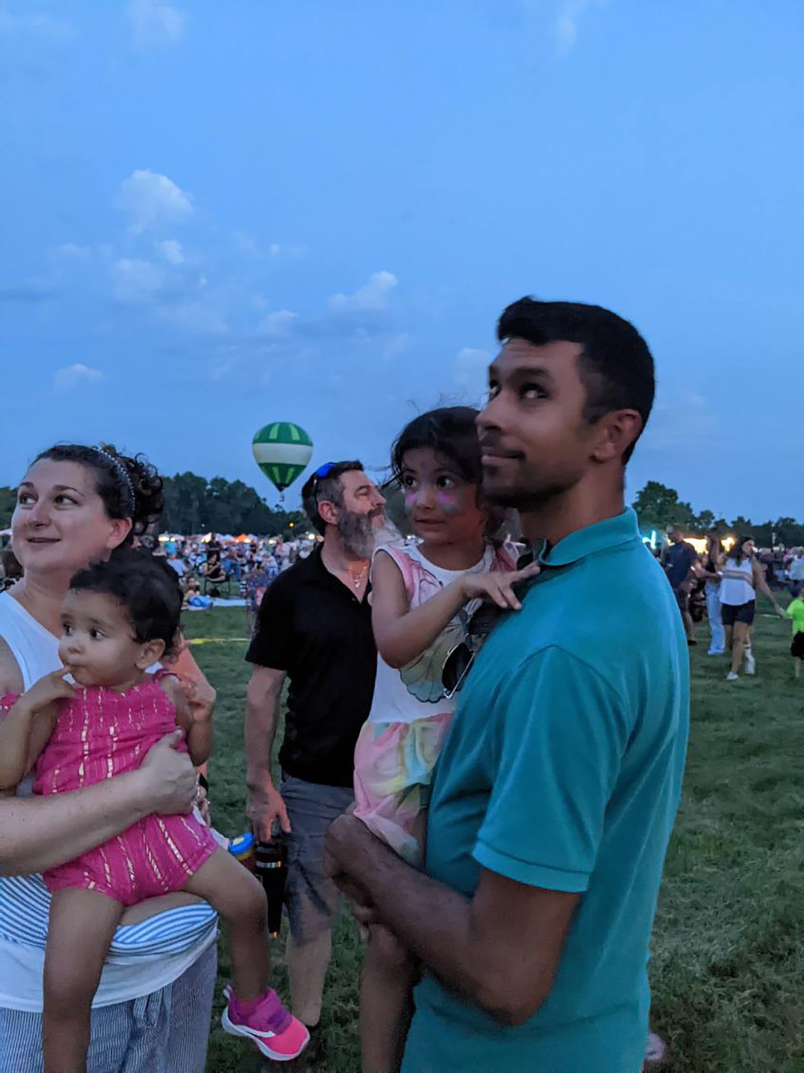 David Rittner (rear center) with his daughter, Jessica's family at the Middletown Balloon Glow in 2022. From left, they are Jessica Rittner Sharma, daughters Hazel and Amelia and husband Akash Sharma. Rittner wanted to improve his sleep so he could spend more quality time with his grandchildren. CONTRIBUTED