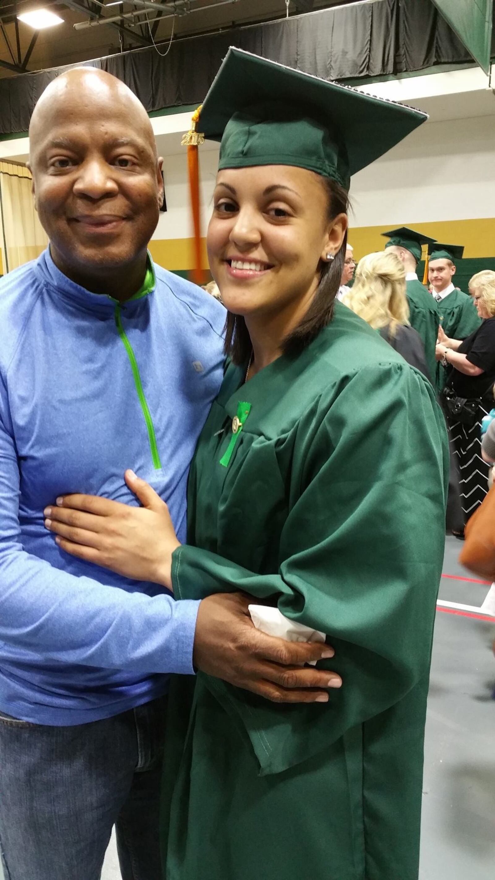 Mylan Woods, a registered nurse at Miami Valley Hospital, with her late father, Derrick, who was the inspiration for her to go  into medicine. In 2010 Derrick had a double lung transplant and lived until 2019. Mylan – who was twice named the Ohio Division II Basketball Player of the Year while at Hathaway Brown, won two state titles there and then played at Northwestern and Wright State –  was moved by the nurses who cared for her father and she wanted to do the same for others one day.  CONTRIBUTED