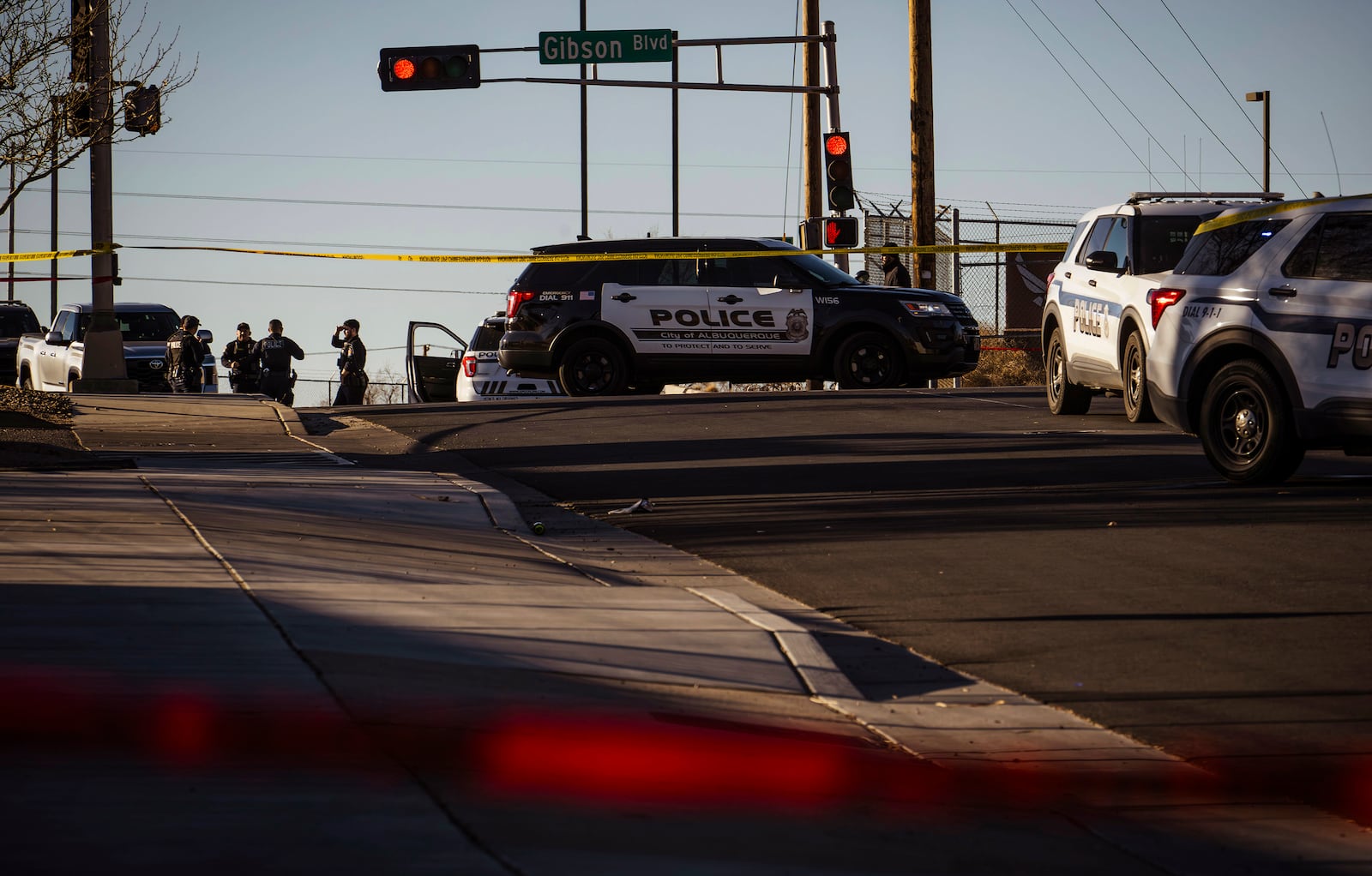 Police respond to a deadly shooting at Kirtland Air Force Base in Albuquerque, N.M., early Saturday, Feb. 22, 2025. (Chancey Bush/The Albuquerque Journal via AP)