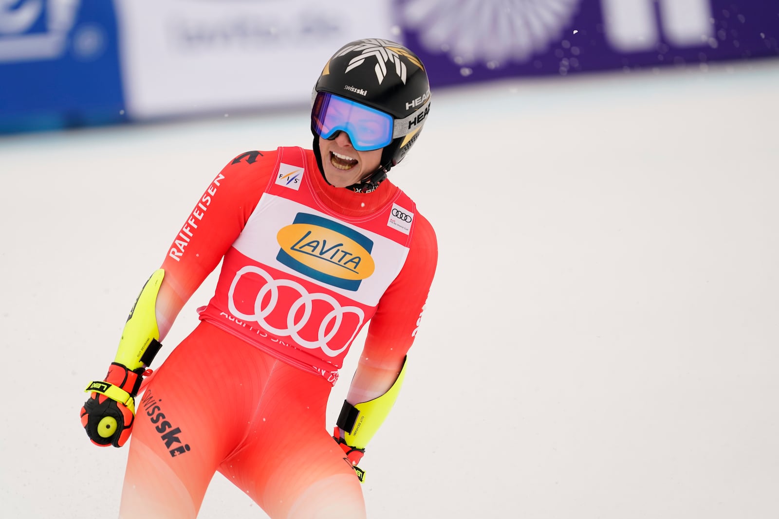 Switzerland's Lara Gut Behrami reacts after completing an alpine ski, women's World Cup super G, in Garmisch, Germany, Sunday, Jan. 26, 2025. (AP Photo/Piermarco Tacca)