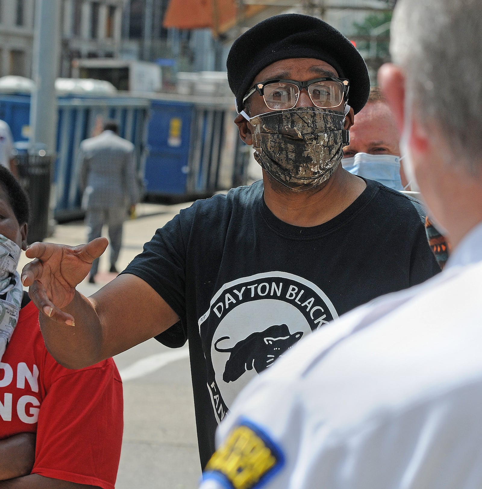 Donald Domineck, chair of the Dayton chapter of new Black Panthers, ask questions to Dayton Police Chief, Richard Biehl, during a press conference at City Hall Wednesday. MARSHALL GORBY\STAFF