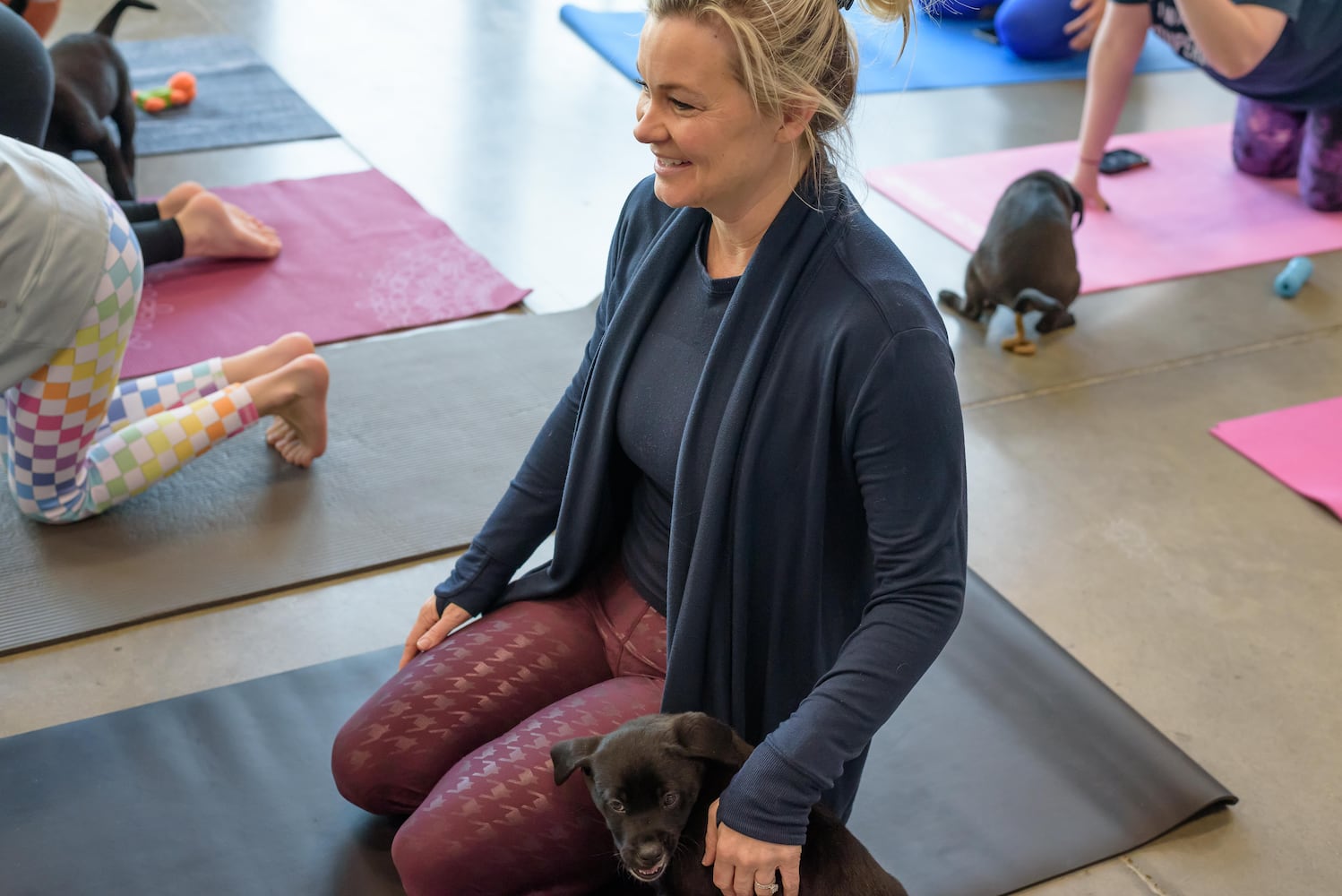 PHOTOS: Puppy Yoga at SICSA Pet Adoption and Wellness Center