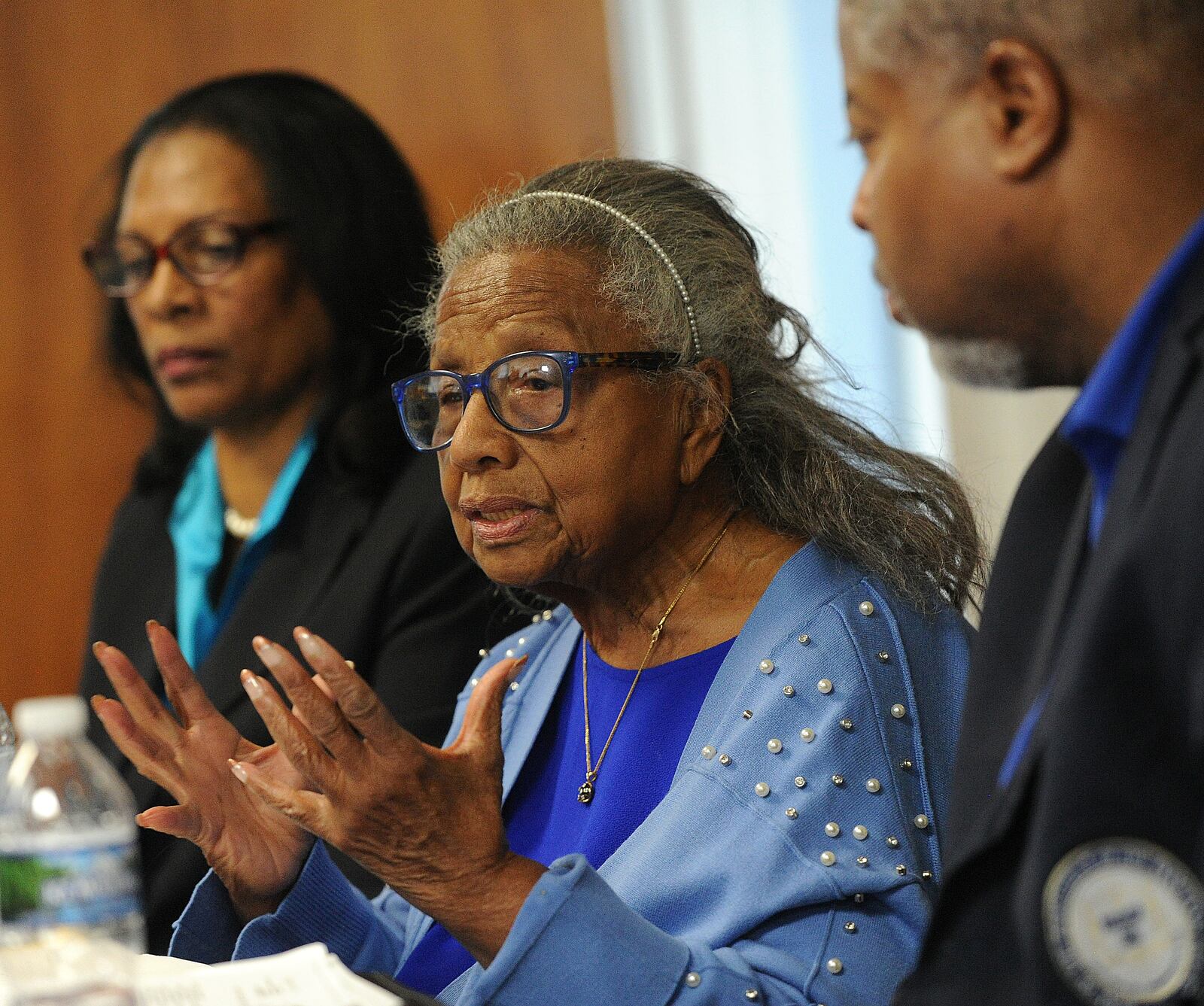 Helen Dewberry, center, talks at a NAACP press conference Monday, Jan. 22, 2024, about how she felt she was treated unjustly at the Sleep Number store in Miami Twp. MARSHALL GORBY/STAFF