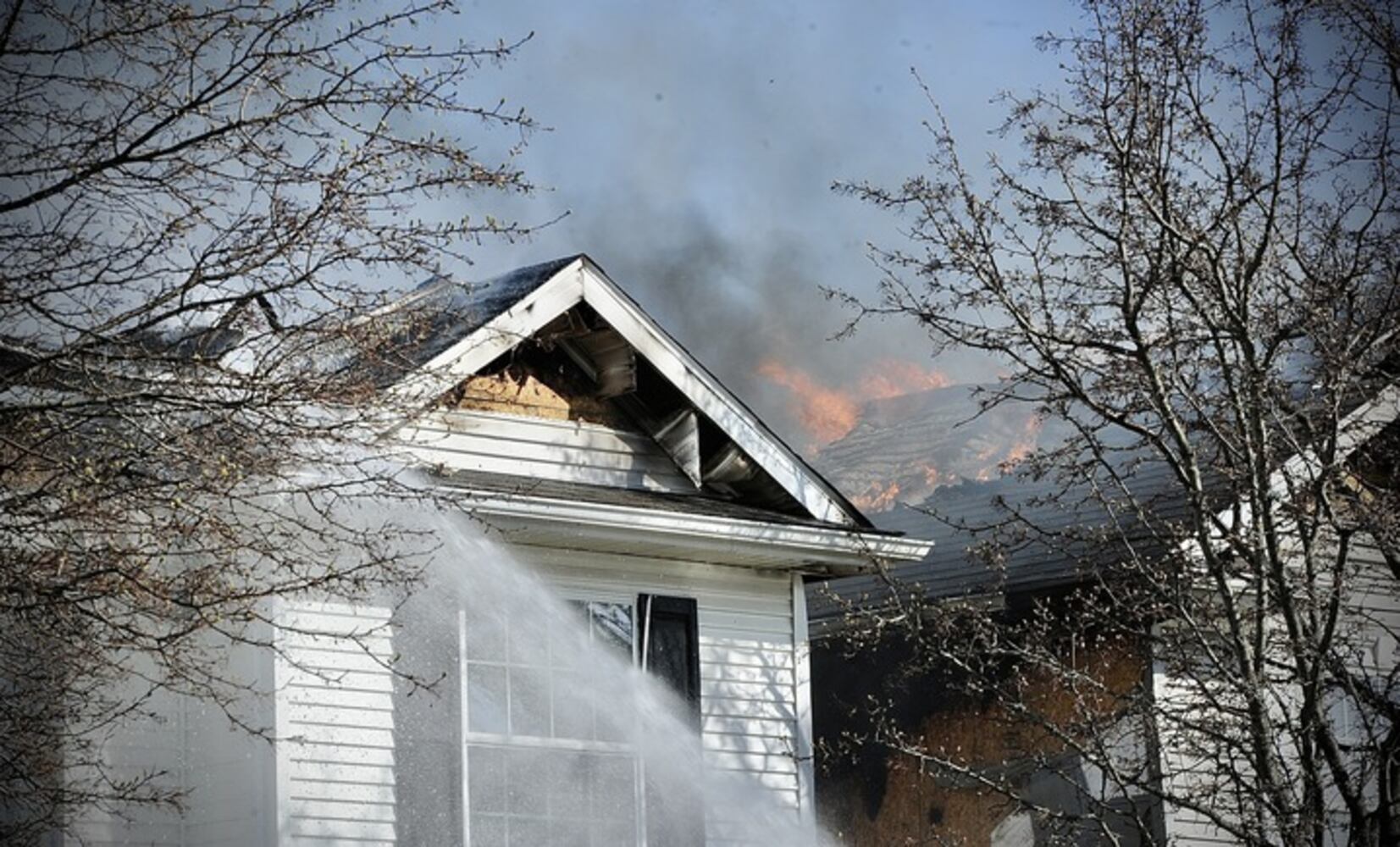 Dayton Fire department battles 2 house fires on Trieschman  Ave.